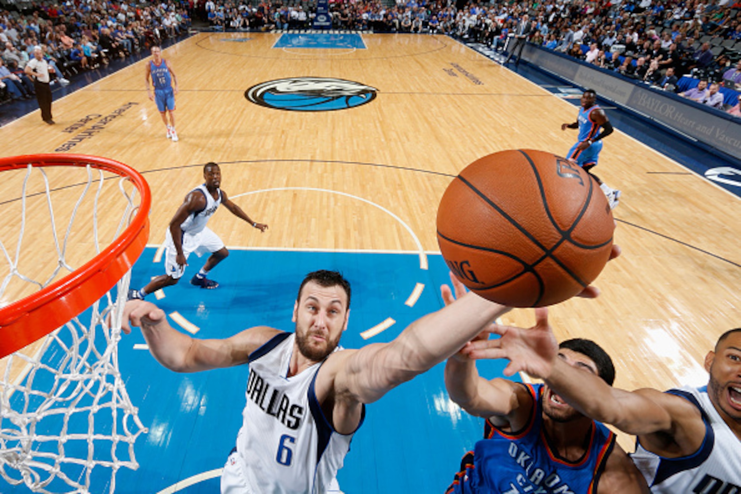 DALLAS, TX - OCTOBER 11:  Andrew Bogut #6 of the Dallas Mavericks fights for the rebound against the Oklahoma City Thunder on October 11, 2016 at the American Airlines Center in Dallas, Texas. NOTE TO USER: User expressly acknowledges and agrees that, by 
