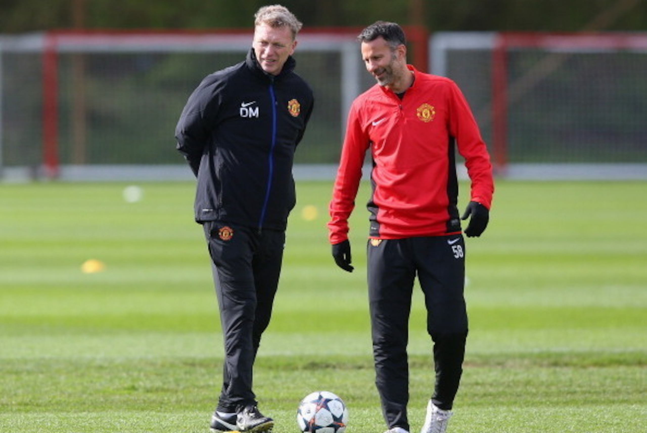 MANCHESTER, ENGLAND - APRIL 08:  David Moyes the manager of Manchester United and Ryan Giggs look on during a training session at Aon Training Complex on April 8, 2014 in Manchester, England.  (Photo by Alex Livesey/Getty Images)