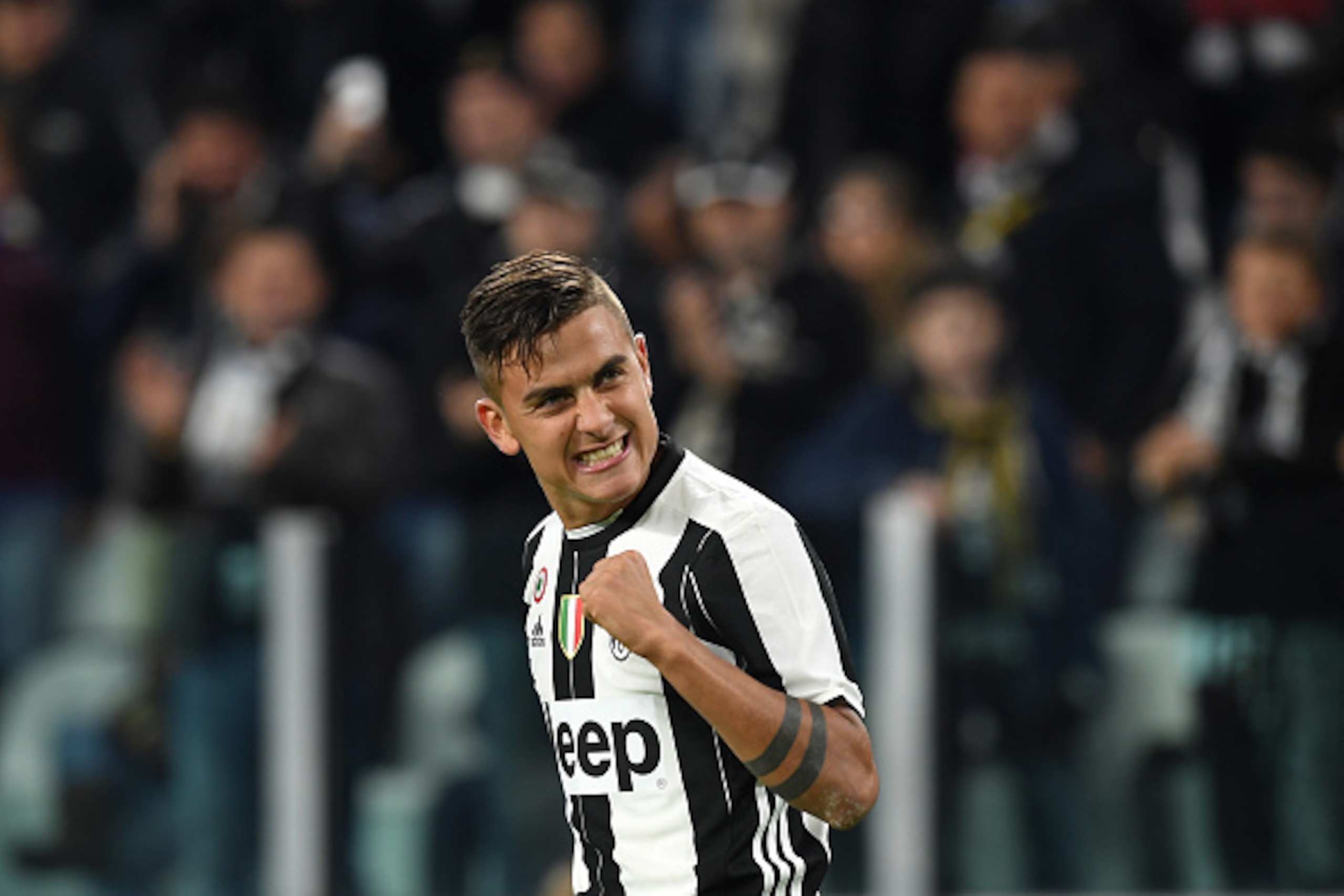 TURIN, ITALY - OCTOBER 15:  Paulo Dybala of Juventus FC celebrates after scoring a goal from the penalty spot during the Serie A match between Juventus FC and Udinese Calcio at Juventus Stadium on October 15, 2016 in Turin, Italy.  (Photo by Valerio Penni