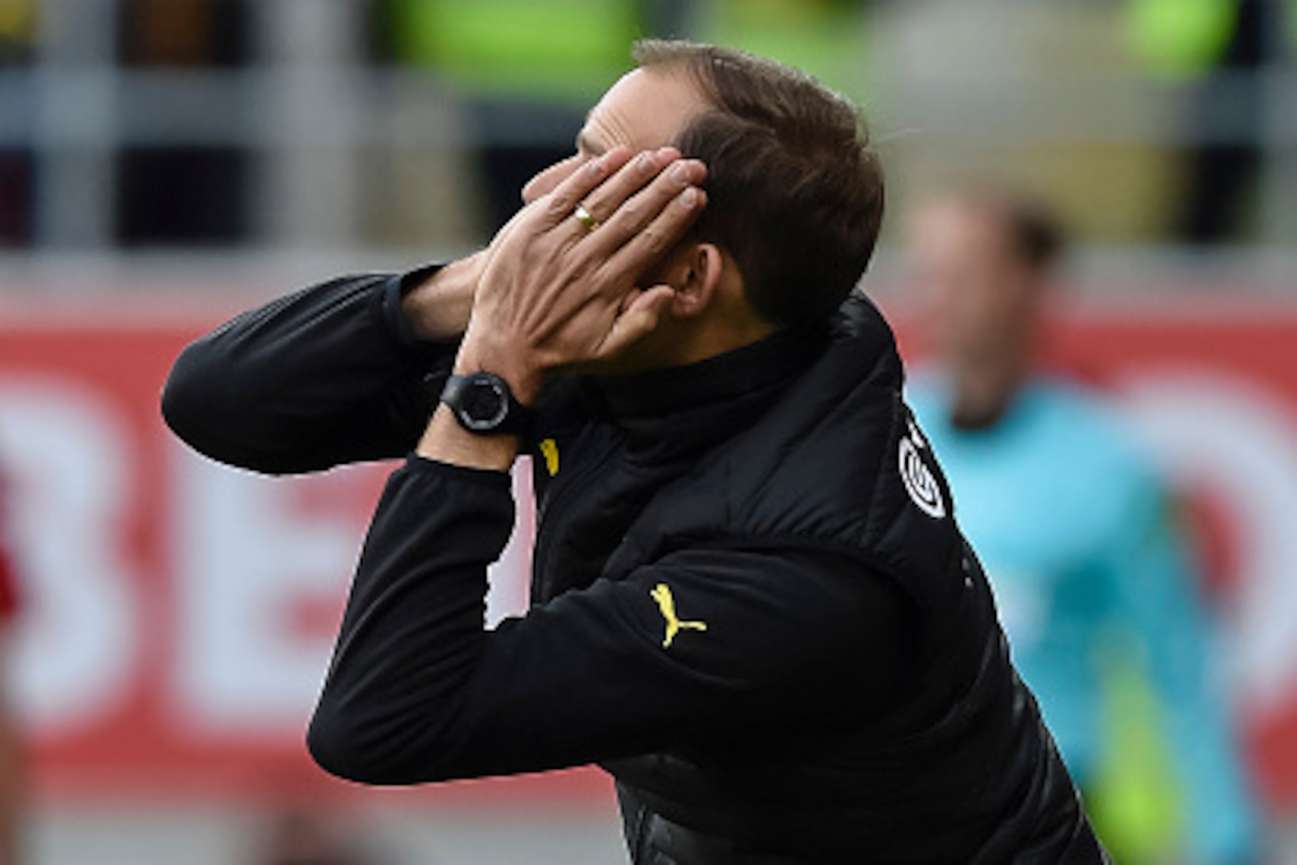 Dortmund's head coach Thomas Tuchel reacts on the sideline during the German first division Bundesliga football match between FC Ingolstadt 04 and Borussia Dortmund in Ingolstadt, southern Germany, on October 22, 2016. / AFP / GUENTER SCHIFFMANN / RESTRIC