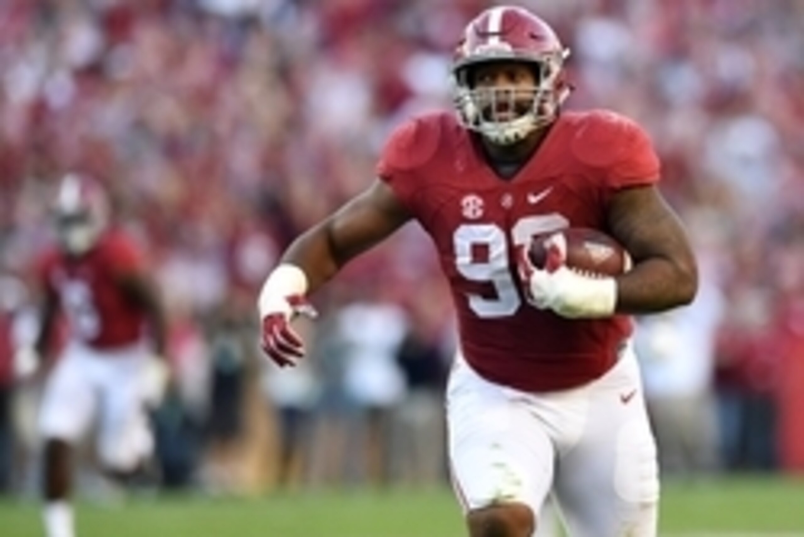 Oct 22, 2016; Tuscaloosa, AL, USA; Alabama Crimson Tide defensive lineman Jonathan Allen (93) returns a fumble for a touchdown against the Texas A&M Aggies during the third quarter at Bryant-Denny Stadium. Mandatory Credit: John David Mercer-USA TODAY Spo