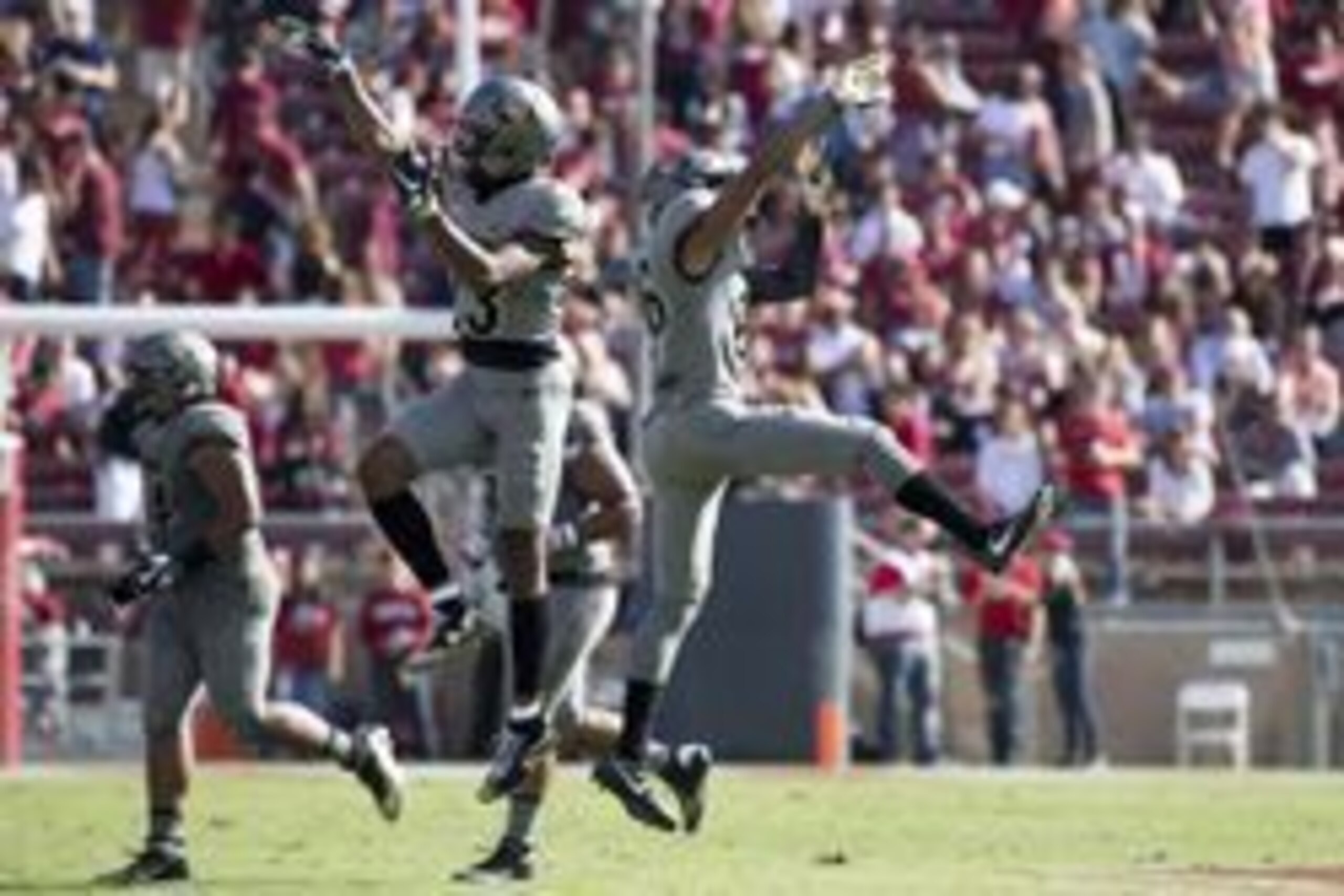 October 22, 2016; Stanford, CA, USA; Colorado Buffaloes defensive back Isaiah Oliver (26) celebrates with defensive back Ahkello Witherspoon (23, left) after Oliver intercepted the football against the Stanford Cardinal during the fourth quarter at Stanfo