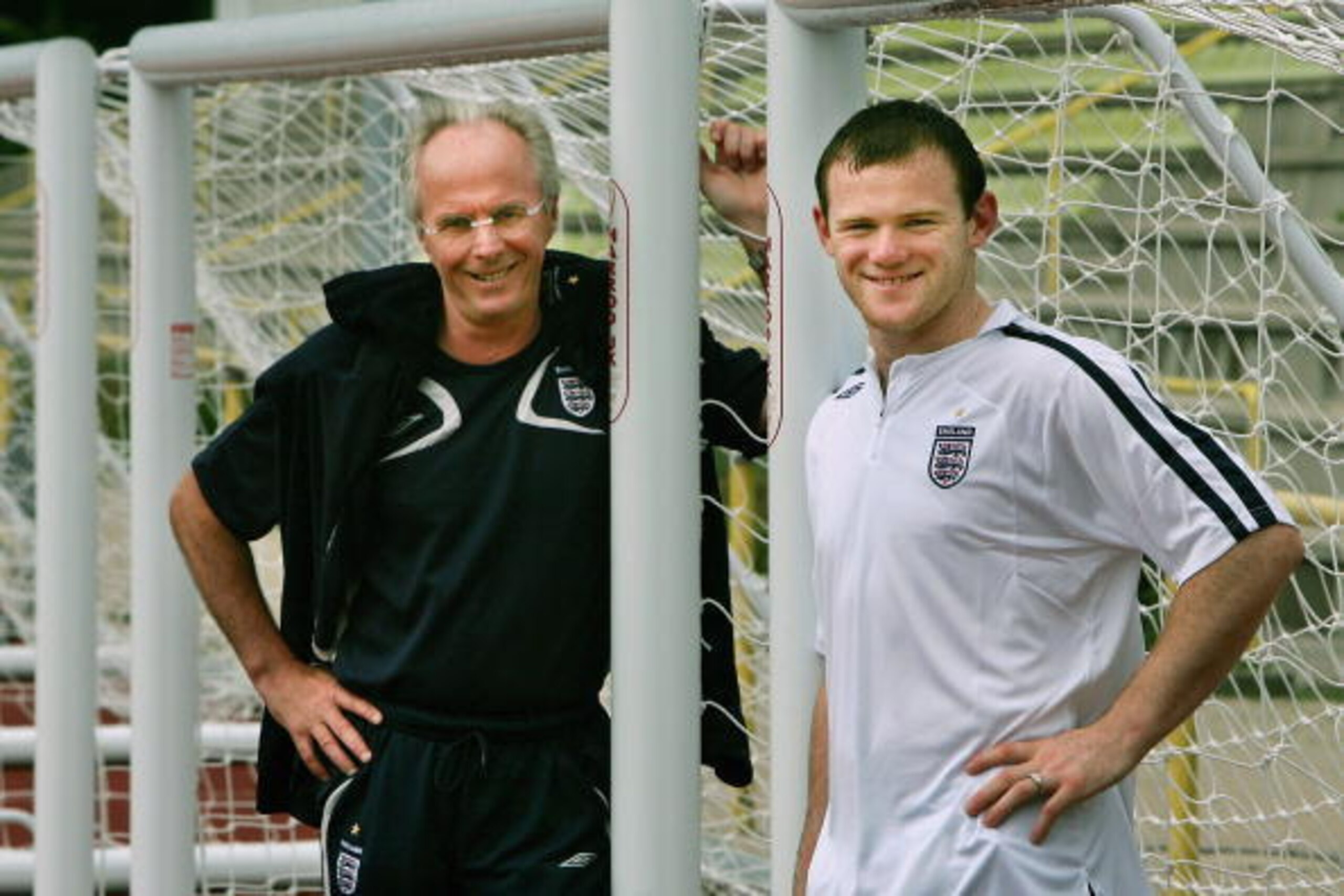 BADEN-BADEN, GERMANY - JUNE 28: Sven Goran Eriksson, the England Head Coach, poses with  Wayne Rooney of England after the team's training session at the England World Cup base on June 28, 2006 in Baden-Baden, Germany. (Photo by Adrian Dennis-Pool/Getty I