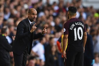 LONDON, ENGLAND - OCTOBER 02:  Josep Guardiola, Manager of Manchester City (L) gives Sergio Aguero of Manchester City (R) instructions during the Premier League match between Tottenham Hotspur and Manchester City at White Hart Lane on October 2, 2016 in L