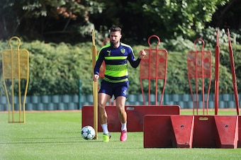 ST ALBANS, ENGLAND - OCTOBER 18:  Olivier Giroud of Arsenal performs a drill during an Arsenal training session on the eve of their UEFA Champions League Group A match against Ludogorets Razgrad at London Colney on October 18, 2016 in St Albans, England. 
