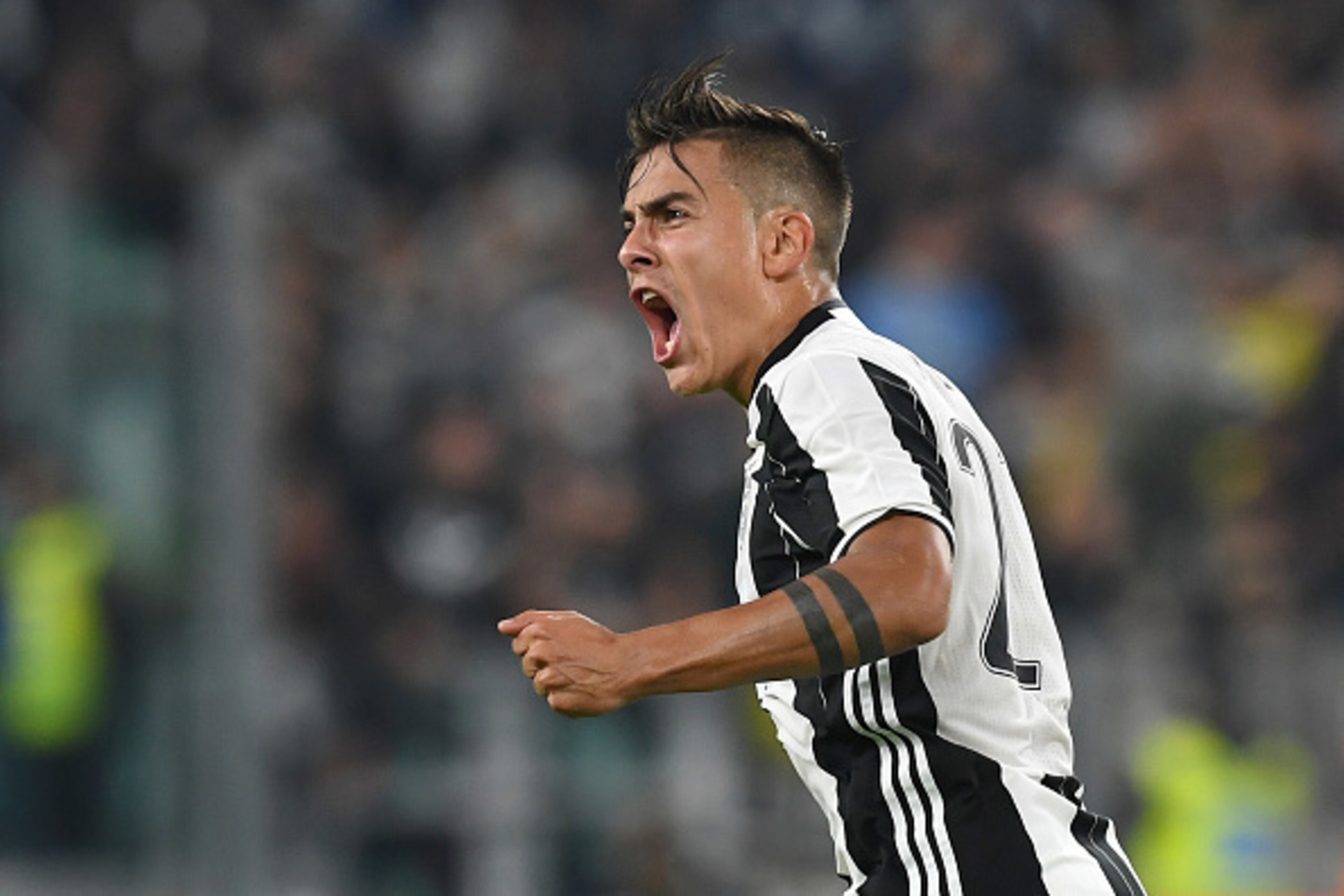 TURIN, ITALY - OCTOBER 15:  Paulo Dybala of Juventus FC celebrates a goal during the Serie A match between Juventus FC and Udinese Calcio at Juventus Stadium on October 15, 2016 in Turin, Italy.  (Photo by Valerio Pennicino/Getty Images)