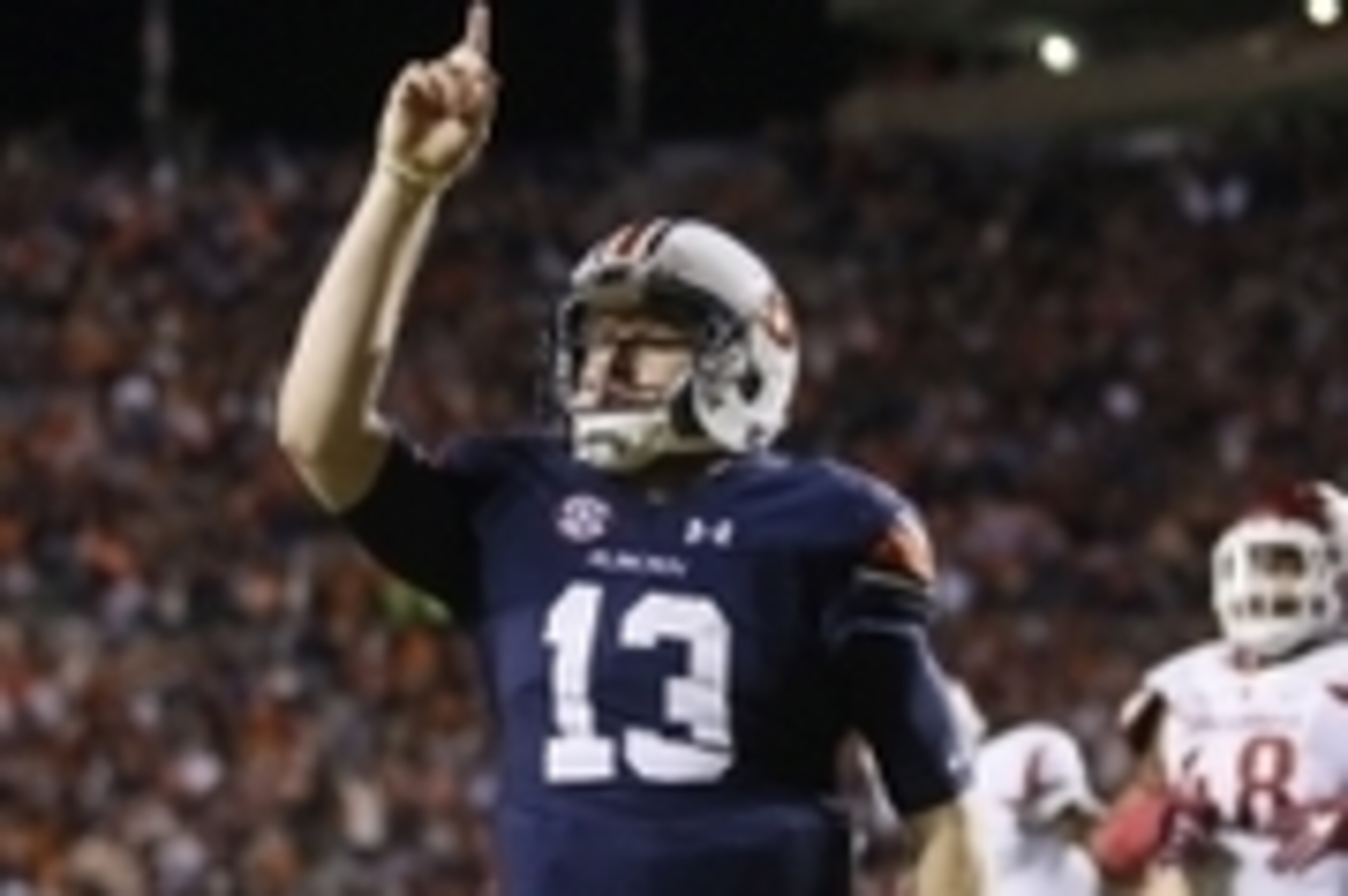 Oct 22, 2016; Auburn, AL, USA; Auburn Tigers quarterback Sean White (13) celebrates after scoring a touchdown against the Arkansas Razorbacks during the third quarter against the Auburn Tigers at Jordan Hare Stadium. The Tigers beat the Razorbacks 56-3. Oct 22, 2016; Auburn, AL, USA; Auburn Tigers quarterback Sean White (13) celebrates after scoring a touchdown against the Arkansas Razorbacks during the third quarter against the Auburn Tigers at Jordan Hare Stadium. The Tigers beat the Razorbacks 56-3.