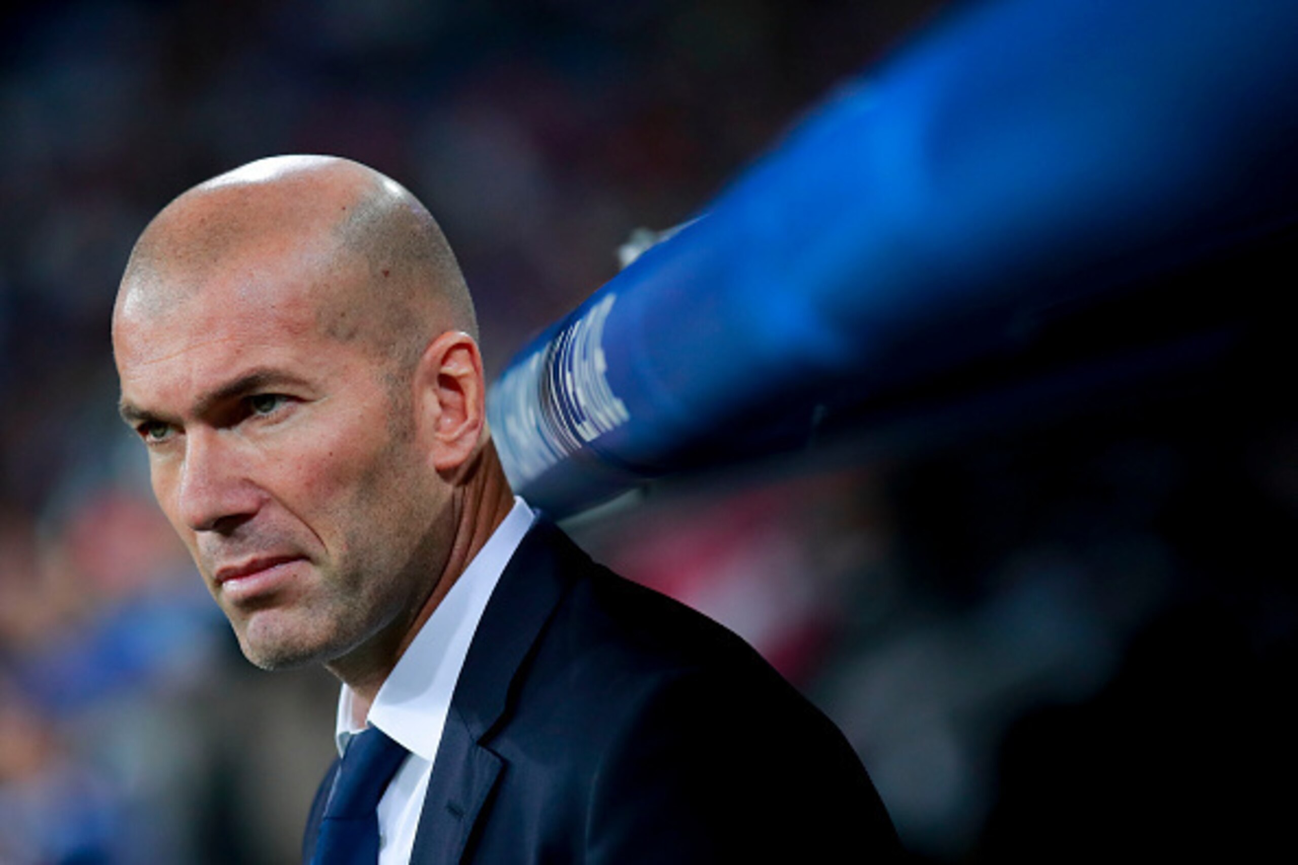 MADRID, SPAIN - OCTOBER 18: Coach Zinedine Zidane of Real Madrid CF looks on ahead the bench prior to start  the UEFA Champions League group F match between Real Madrid CF and Legia Warszawa at Santiago Bernabeu stadium on October 18, 2016 in Madrid, Spai