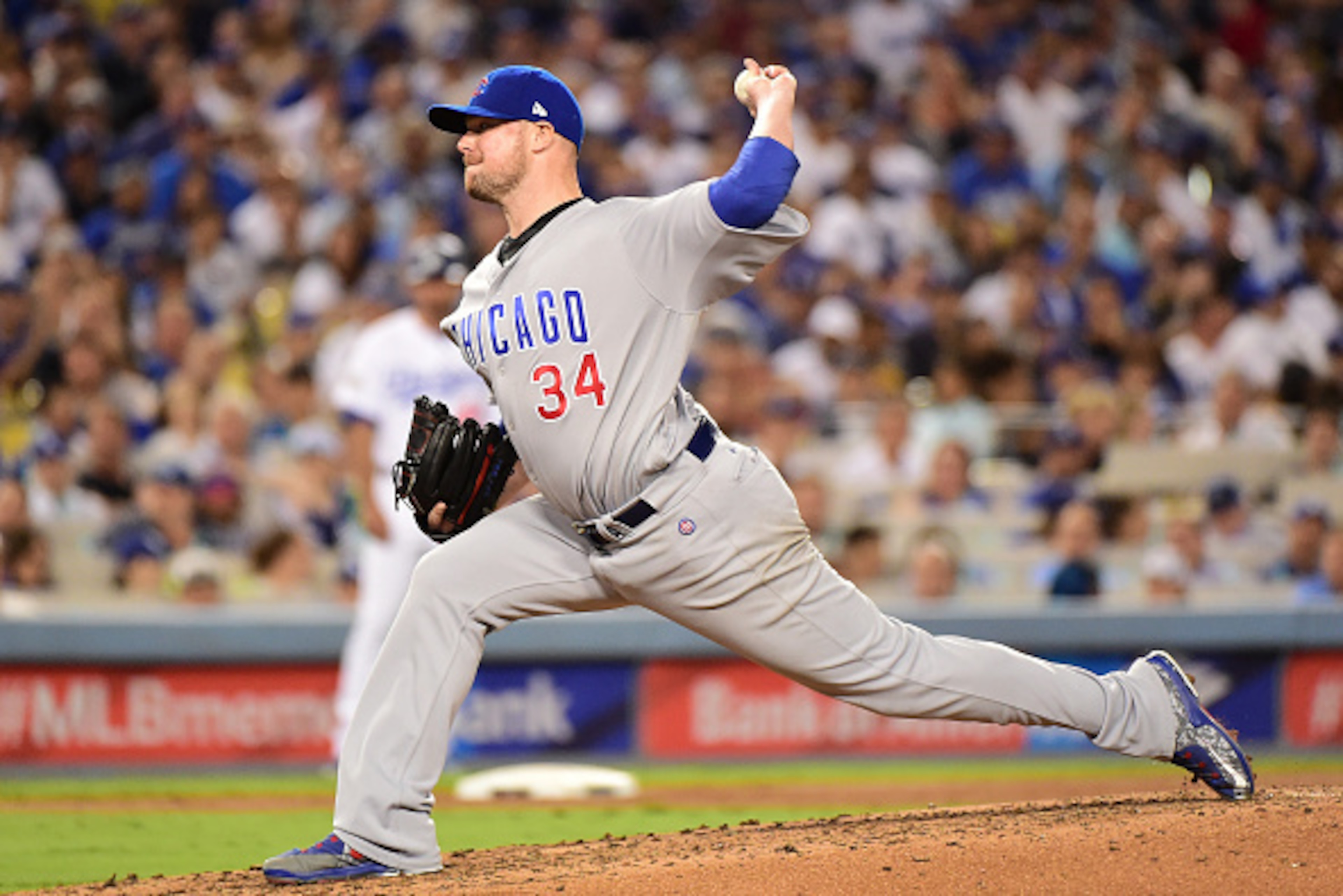 LOS ANGELES, CA - OCTOBER 20:  Jon Lester #34 of the Chicago Cubs pitches in the fifth inning against the Los Angeles Dodgers in game five of the National League Division Series at Dodger Stadium on October 20, 2016 in Los Angeles, California.  (Photo by 