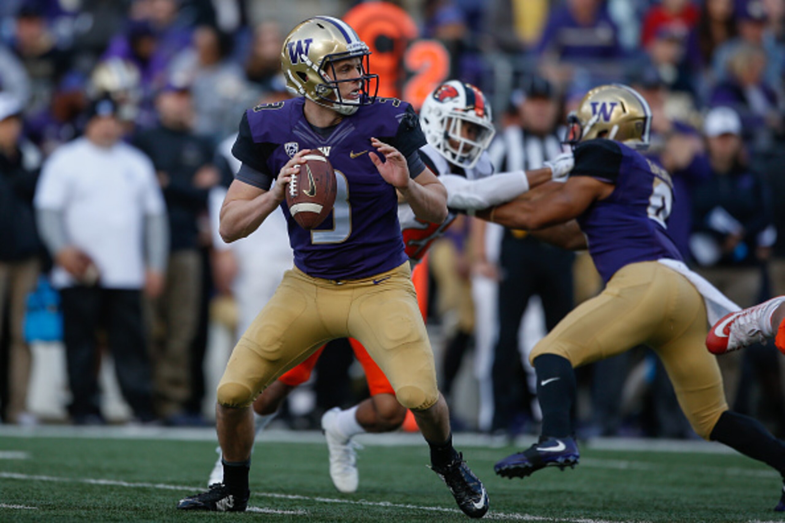 SEATTLE, WA - OCTOBER 22:  Quarterback Jake Browning #3 of the Washington Huskies looks downfield to pass against the Oregon State Beavers on October 22, 2016 at Husky Stadium in Seattle, Washington.  (Photo by Otto Greule Jr/Getty Images)