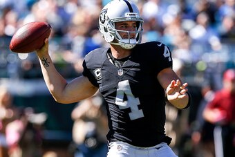 JACKSONVILLE, FL - OCTOBER 23: Quarterback Derek Carr #4 of the Oakland Raiders on a pass play during the game against the Jacksonville Jaguars at EverBank Field on October 23, 2016 in Jacksonville, Florida. The Raiders defeated the Jaguars 33 to 16. (Pho