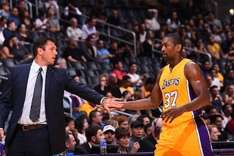 LOS ANGELES, CA - OCTOBER 7: Luke Walton and Metta World Peace #37 of the Los Angeles Lakers are seen against the Denver Nuggets during a preseason game on October 7, 2016 at STAPLES Center in Los Angeles, California. NOTE TO USER: User expressly acknowle