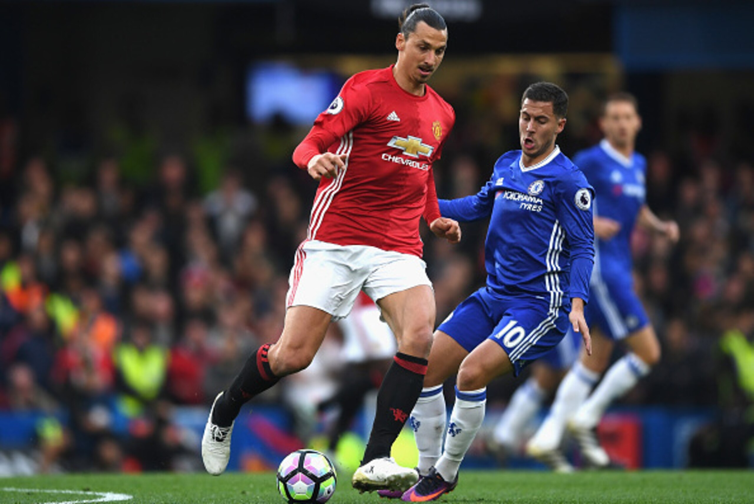 LONDON, ENGLAND - OCTOBER 23: Zlatan Ibrahimovic of Manchester United is closed down by Eden Hazard of Chelsea during the Premier League match between Chelsea and Manchester United at Stamford Bridge on October 23, 2016 in London, England. (Photo by Sha LONDON, ENGLAND - OCTOBER 23: Zlatan Ibrahimovic of Manchester United is closed down by Eden Hazard of Chelsea during the Premier League match between Chelsea and Manchester United at Stamford Bridge on October 23, 2016 in London, England. (Photo by Sha