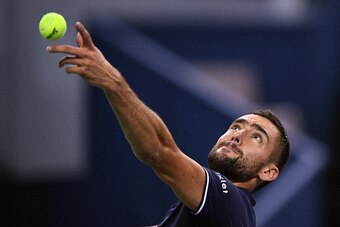 Marin Cilic of Croatia serves against Alexander Zverev of Germany during their men's singles match at the Shanghai Masters tennis tournament in Shanghai on October 11, 2016. / AFP / JOHANNES EISELE        (Photo credit should read JOHANNES EISELE/AFP/Gett