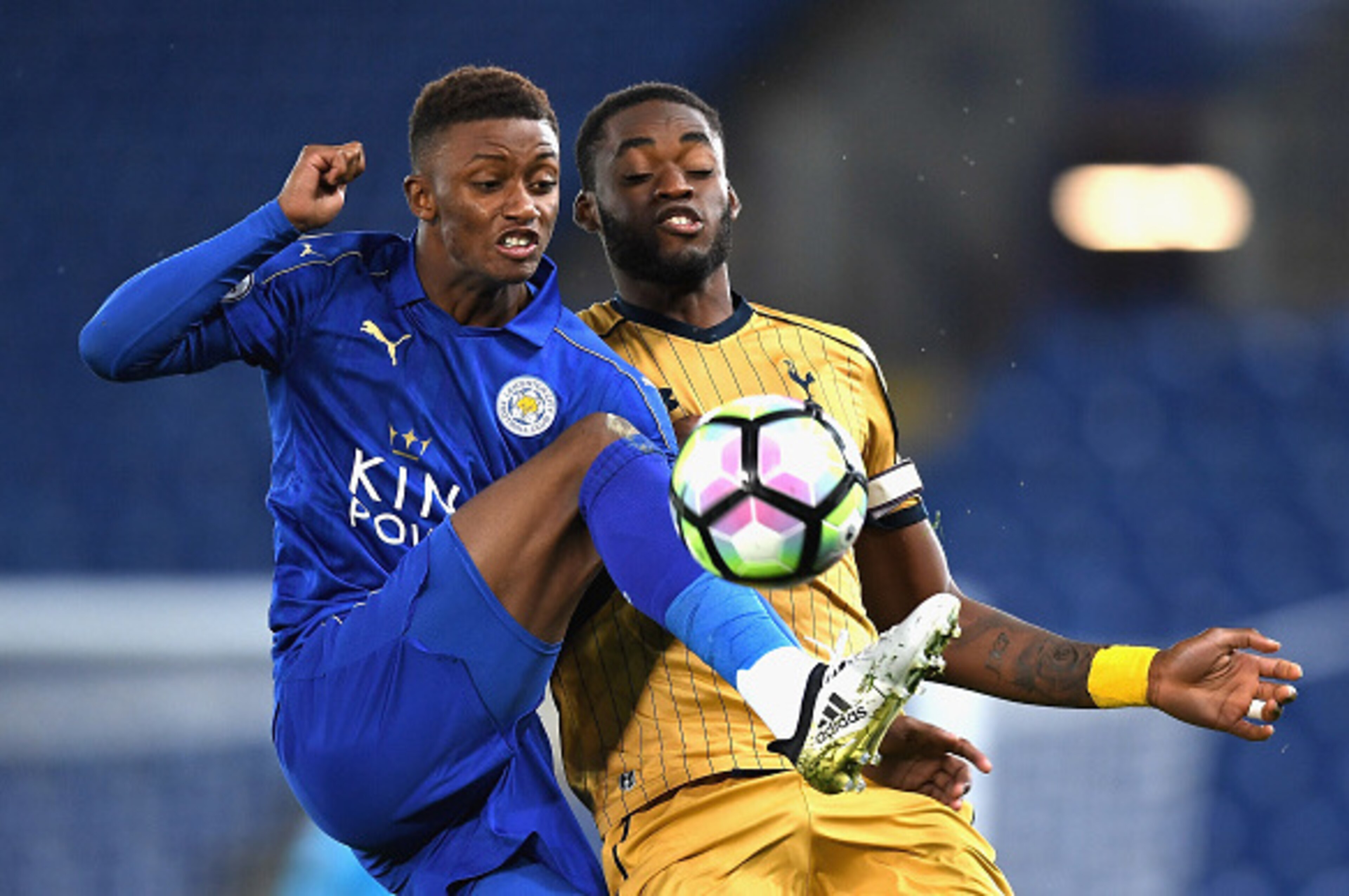 LEICESTER, ENGLAND - OCTOBER 24: Demarai Gray of Leicester City controlls the bull under pressure from Christian Maghoma of Tottenham Hotspur during the Premier League 2 match between Leicester City and Tottenham Hotspur at The King Power Stadium on Octob LEICESTER, ENGLAND - OCTOBER 24: Demarai Gray of Leicester City controlls the bull under pressure from Christian Maghoma of Tottenham Hotspur during the Premier League 2 match between Leicester City and Tottenham Hotspur at The King Power Stadium on Octob
