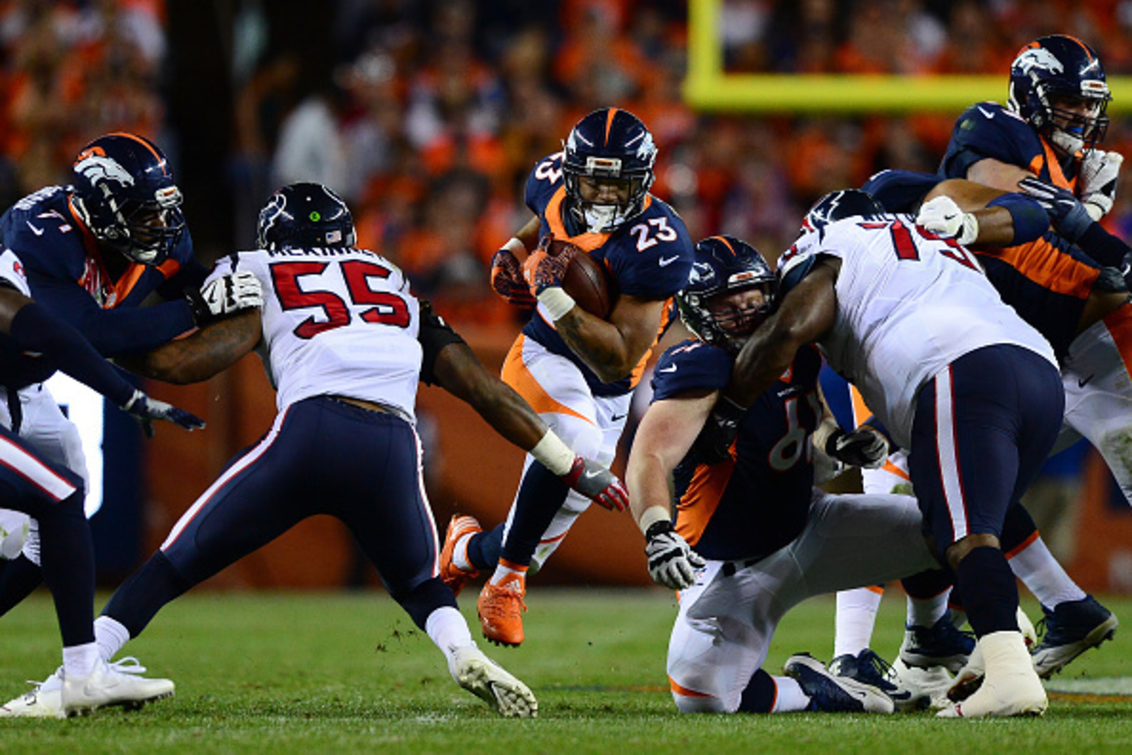 DENVER, CO - OCTOBER 24:  Running back Devontae Booker #23 of the Denver Broncos rushes for 10 yards in the second quarter of the game against the Houston Texans at Sports Authority Field at Mile High on October 24, 2016 in Denver, Colorado. (Photo by Dus
