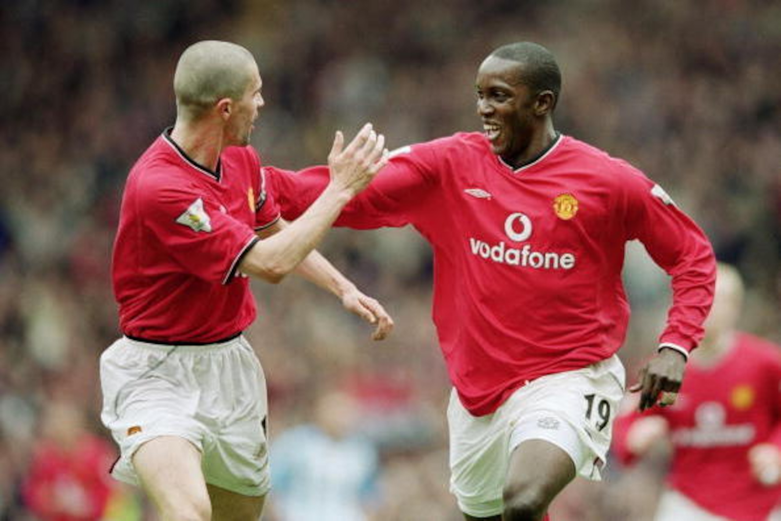 14 Apr 2001:  Manchester United goal scorer Dwight Yorke is congratulated by team mate Roy Keane during the FA Carling Premiership match against Coventry City at Old Trafford in Manchester, England. United won 4-2. \ Mandatory Credit: Clive Brunskill /All