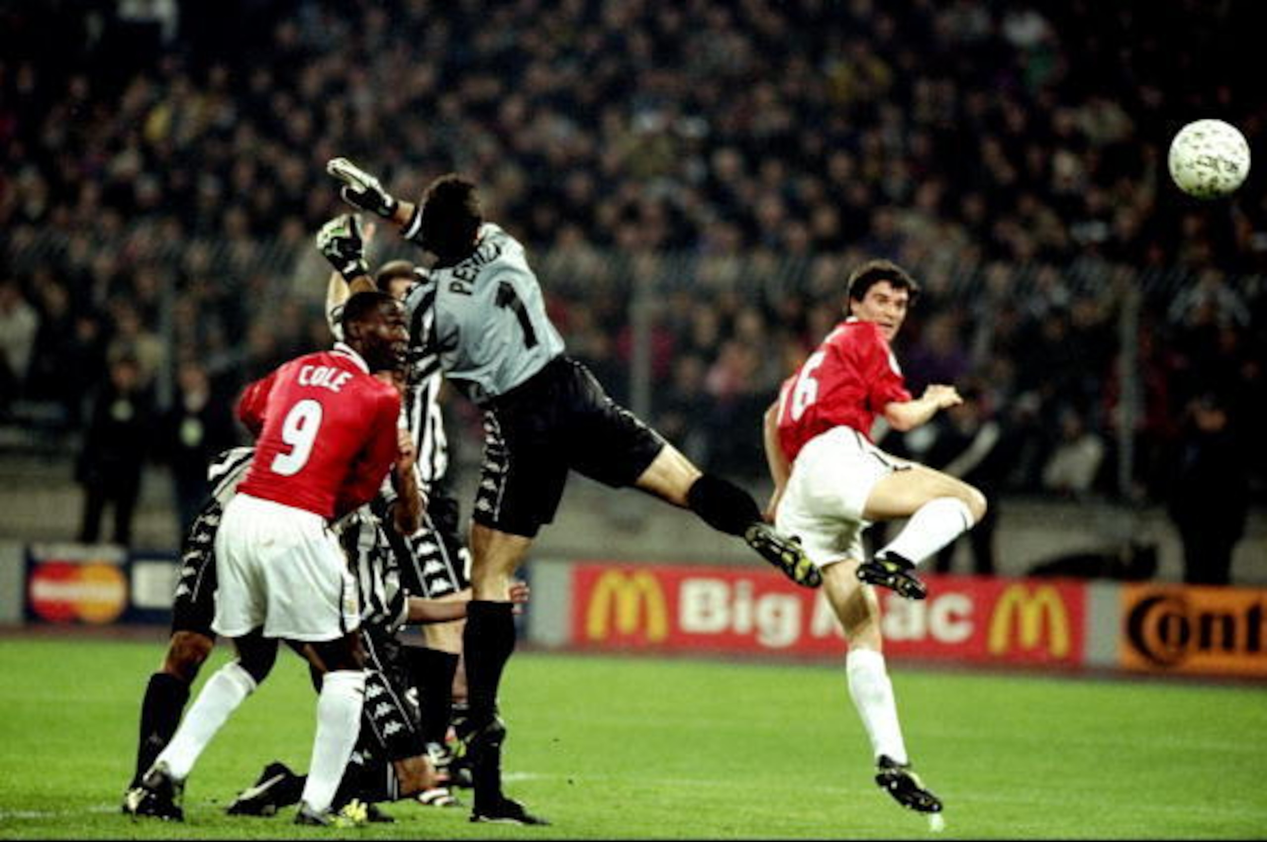 21 Apr 1999:  Manchester United captain Roy Keane gets infront of Juventus keeper Angelo Peruzzi to head home during the UEFA Champions League semi-final second leg match at the Stadio delle Alpi in Turin, Italy. United won 3-2 on the night to go through4