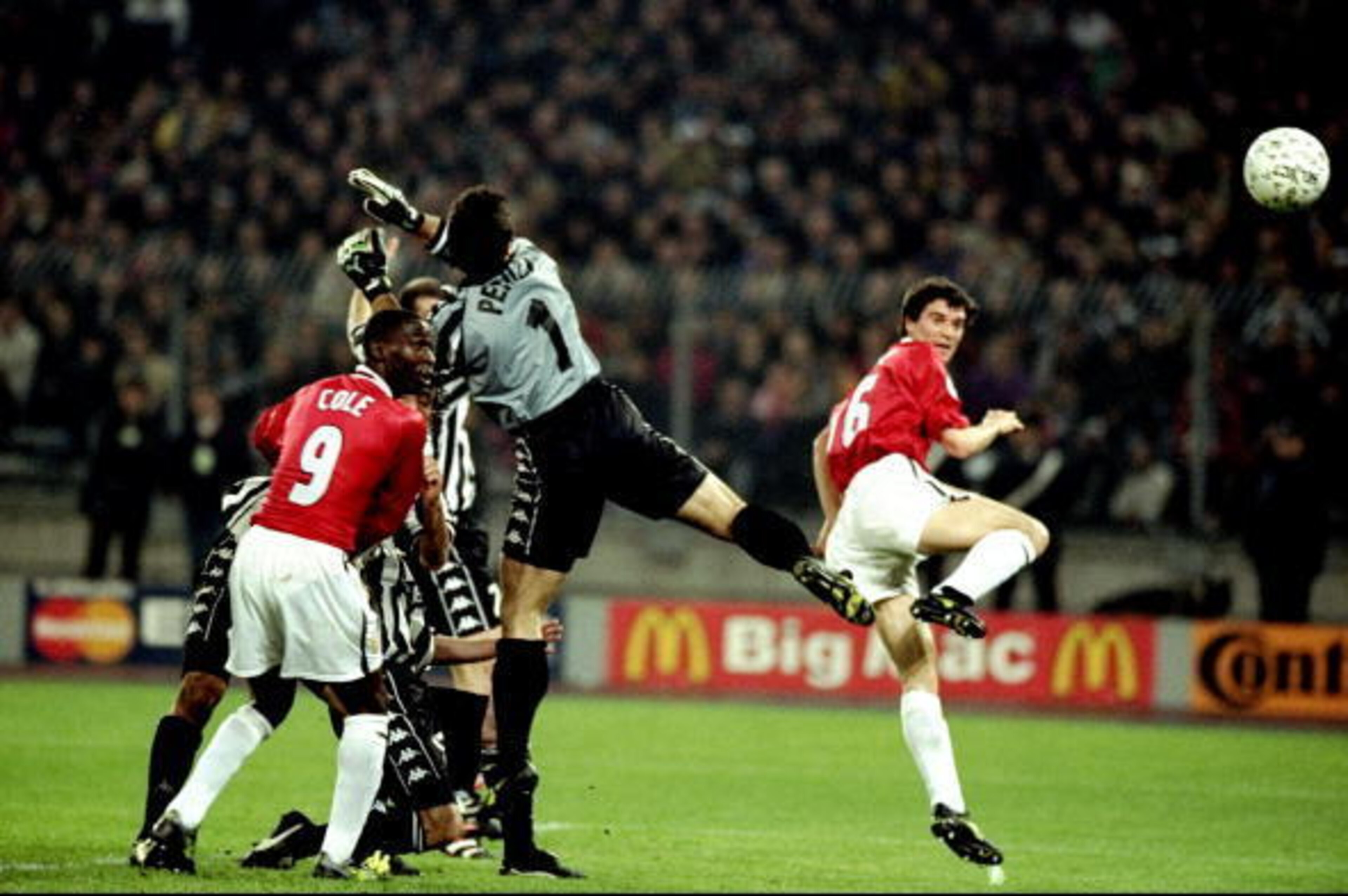21 Apr 1999: Manchester United captain Roy Keane gets infront of Juventus keeper Angelo Peruzzi to head home during the UEFA Champions League semi-final second leg match at the Stadio delle Alpi in Turin, Italy. United won 3-2 on the night to go through4 21 Apr 1999: Manchester United captain Roy Keane gets infront of Juventus keeper Angelo Peruzzi to head home during the UEFA Champions League semi-final second leg match at the Stadio delle Alpi in Turin, Italy. United won 3-2 on the night to go through4
