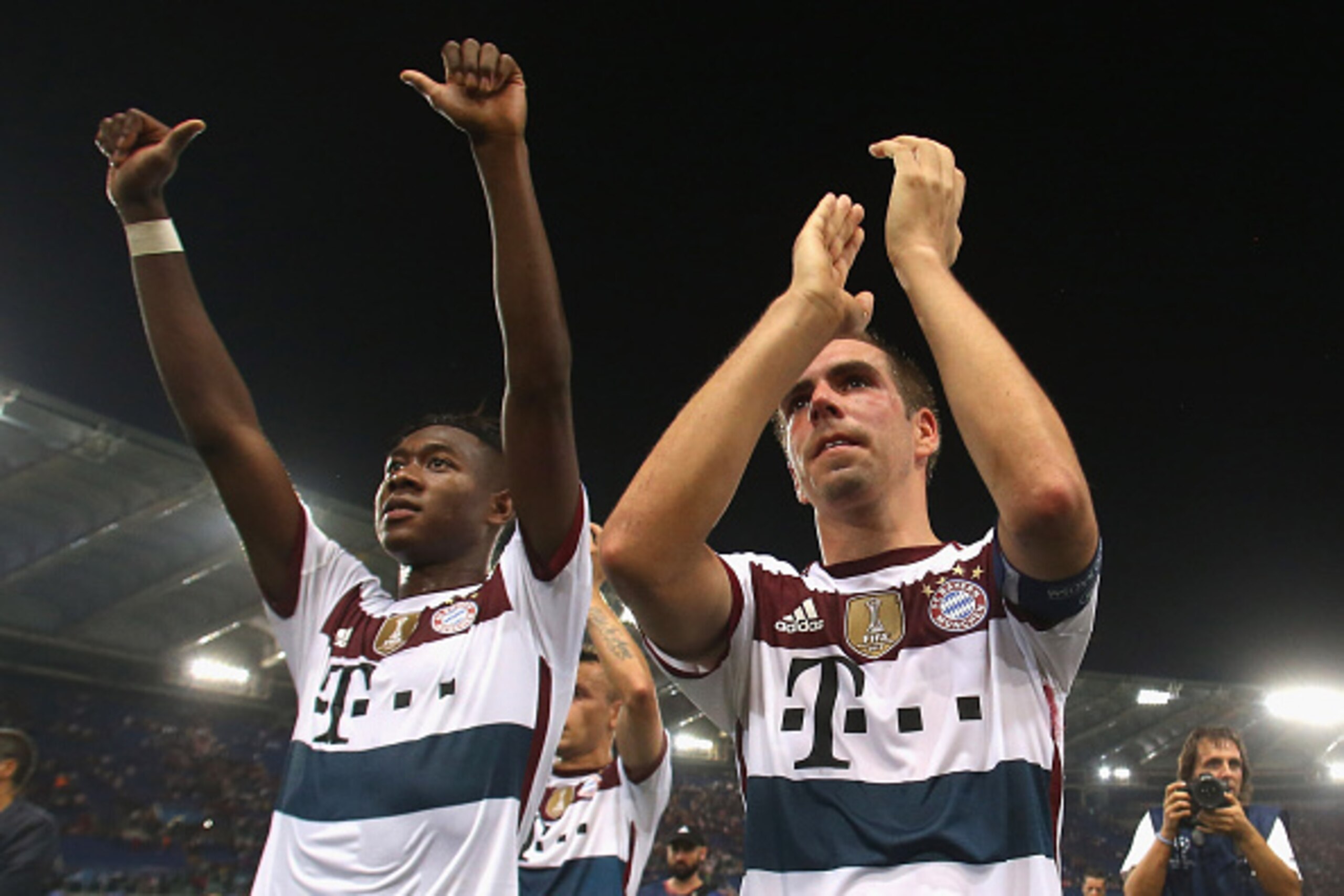 ROME, ITALY - OCTOBER 21:  David Alaba (L) and Philipp Lahm of Bayern Muenchen celebrate after the UEFA Champions League match between AS Roma and FC Bayern Munchen at Stadio Olimpico on October 21, 2014 in Rome, Italy  (Photo by Maurizio Lagana/Getty Ima