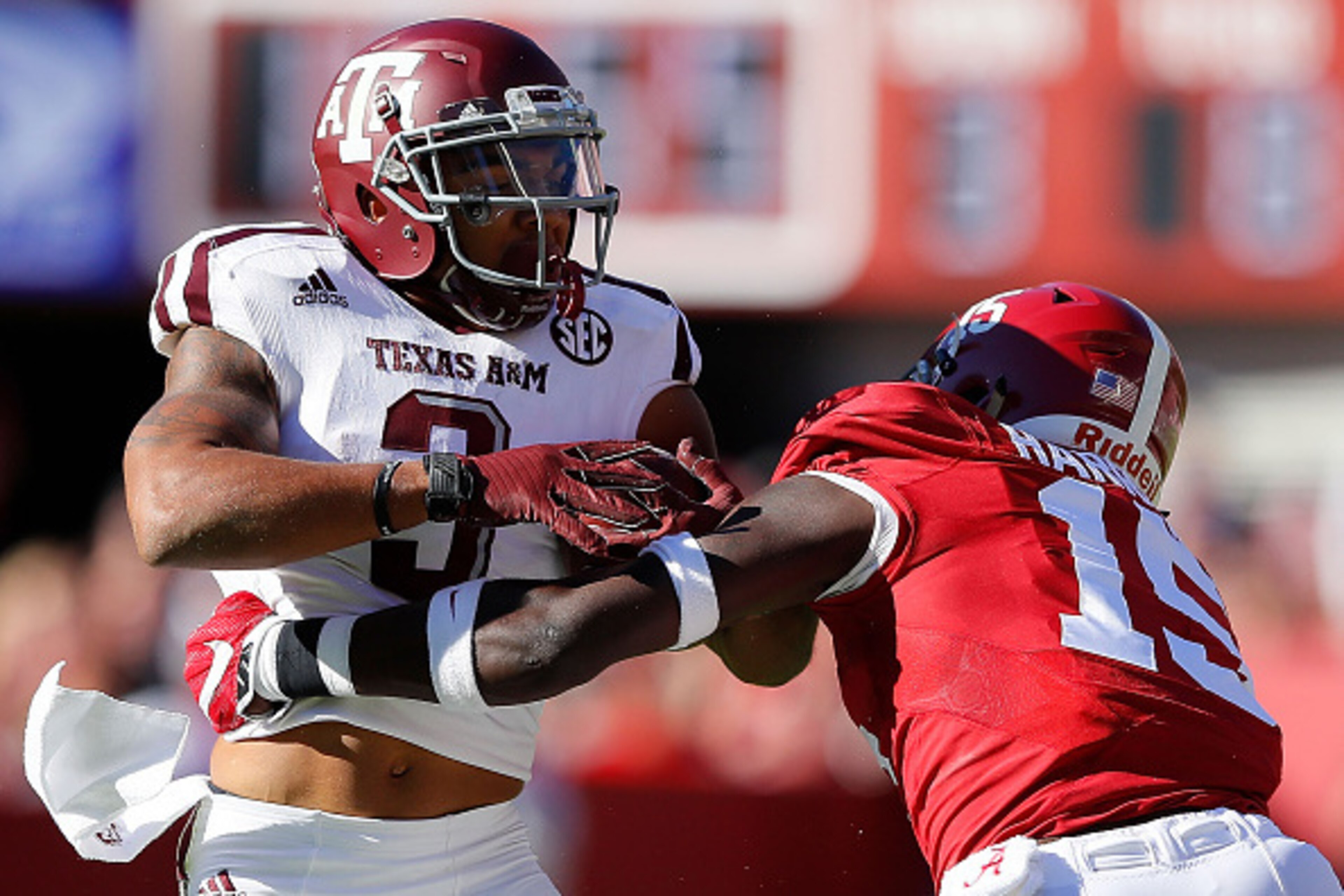 TUSCALOOSA, AL - OCTOBER 22: Ronnie Harrison #15 of the Alabama Crimson Tide tackles Christian Kirk #3 of the Texas A&M Aggies at Bryant-Denny Stadium on October 22, 2016 in Tuscaloosa, Alabama. (Photo by Kevin C. Cox/Getty Images) TUSCALOOSA, AL - OCTOBER 22: Ronnie Harrison #15 of the Alabama Crimson Tide tackles Christian Kirk #3 of the Texas A&M Aggies at Bryant-Denny Stadium on October 22, 2016 in Tuscaloosa, Alabama. (Photo by Kevin C. Cox/Getty Images)