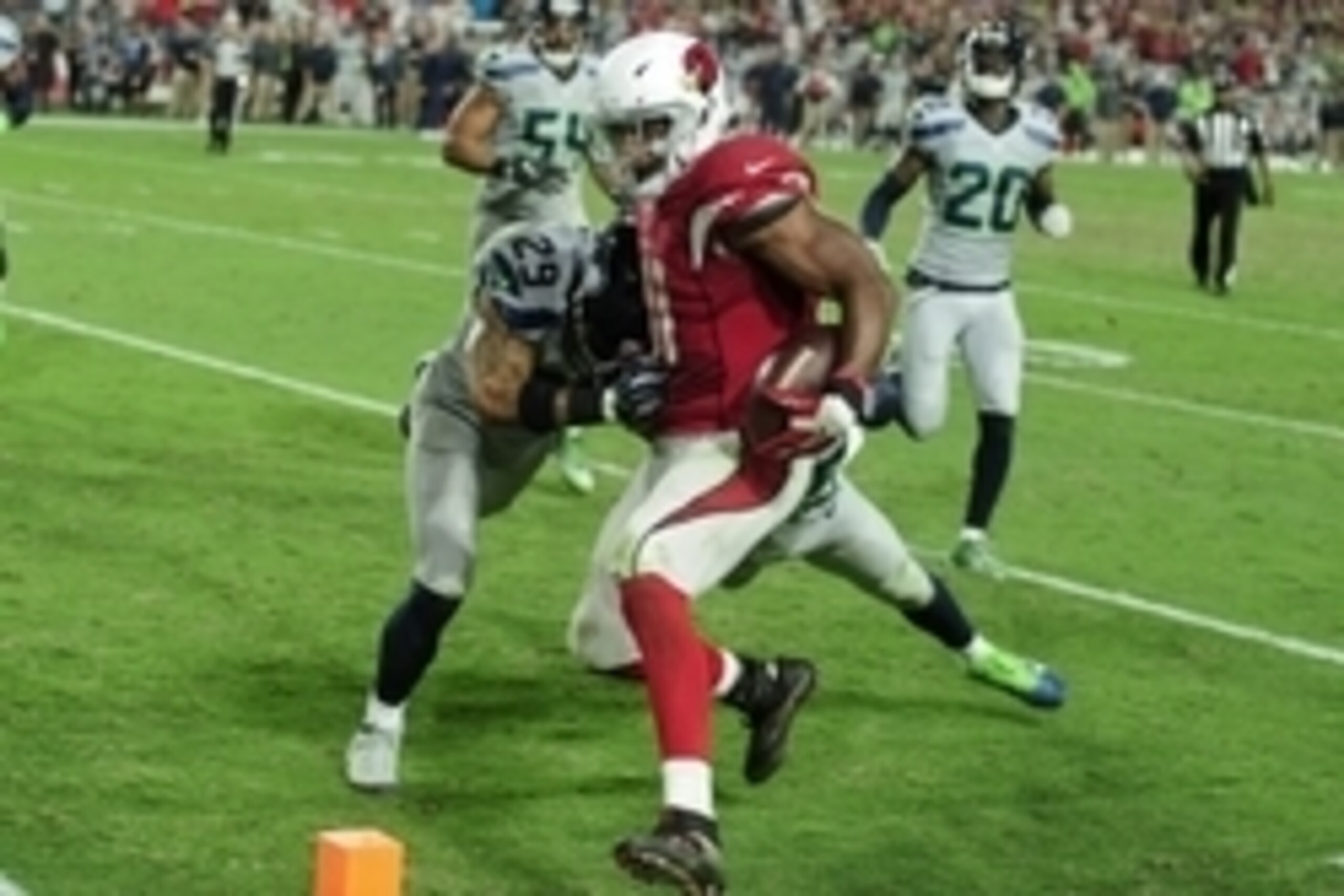Oct 23, 2016; Glendale, AZ, USA; Arizona Cardinals running back David Johnson (31) reachs for the endzone as Seattle Seahawks free safety Earl Thomas (29) defends during overtime at University of Phoenix Stadium. Mandatory Credit: Matt Kartozian-USA TODAY Oct 23, 2016; Glendale, AZ, USA; Arizona Cardinals running back David Johnson (31) reachs for the endzone as Seattle Seahawks free safety Earl Thomas (29) defends during overtime at University of Phoenix Stadium. Mandatory Credit: Matt Kartozian-USA TODAY