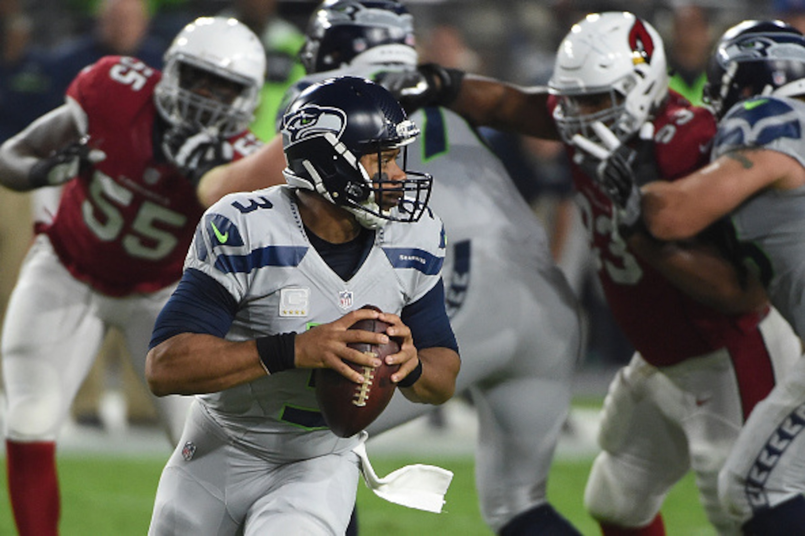 GLENDALE, AZ - OCTOBER 23:  Seattle Seahawks quarterback Russell Wilson #3 drops back to make a pass in the first half of the NFL game against the Arizona Cardinals at University of Phoenix Stadium on October 23, 2016 in Glendale, Arizona.  (Photo by Norm