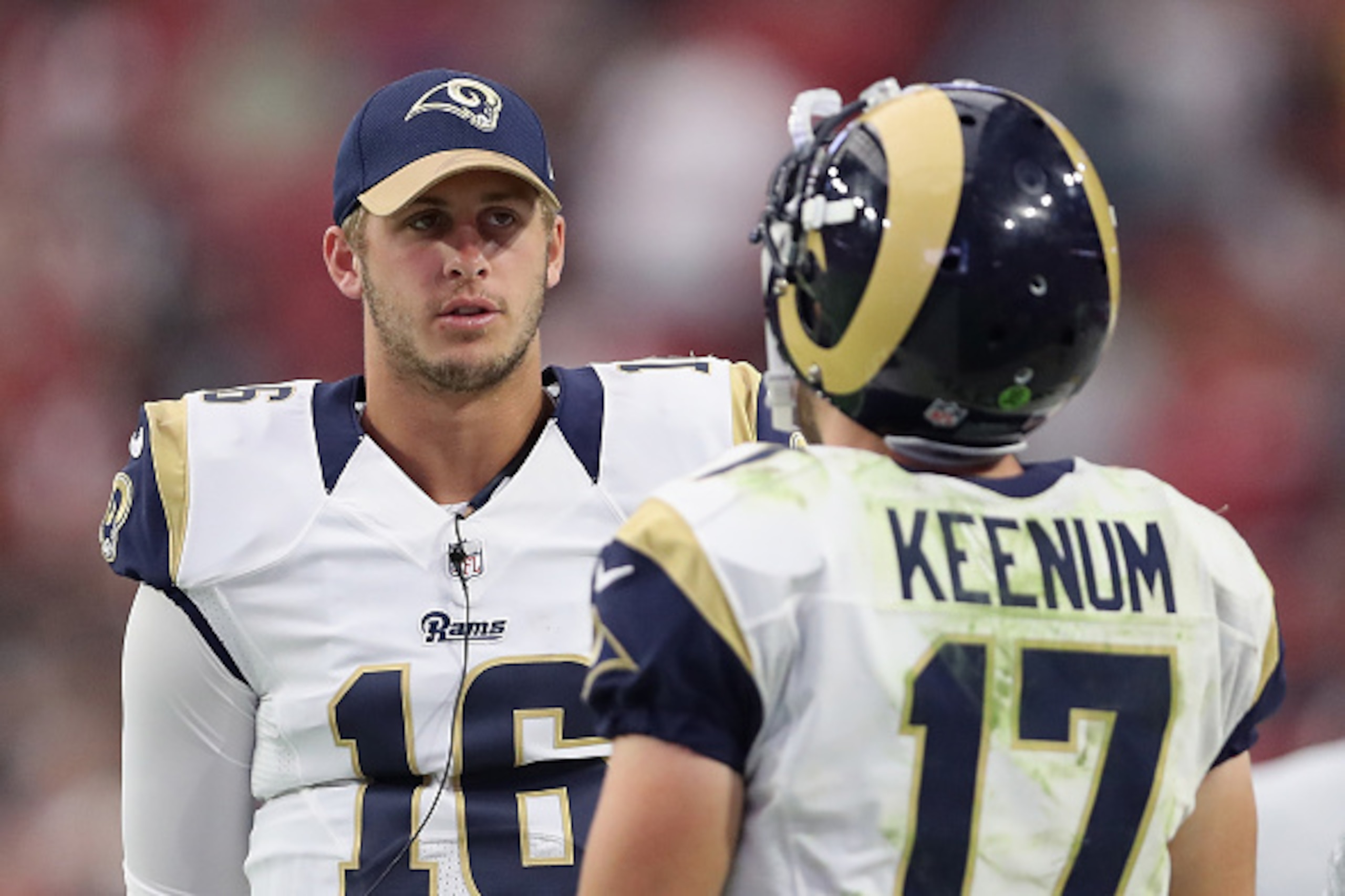 GLENDALE, AZ - OCTOBER 02:  Quarterback Jared Goff #16 of the Los Angeles Rams talks with Case Keenum #17 on the sidelines during the NFL game against the Arizona Cardinals at the University of Phoenix Stadium on October 2, 2016 in Glendale, Arizona.  The