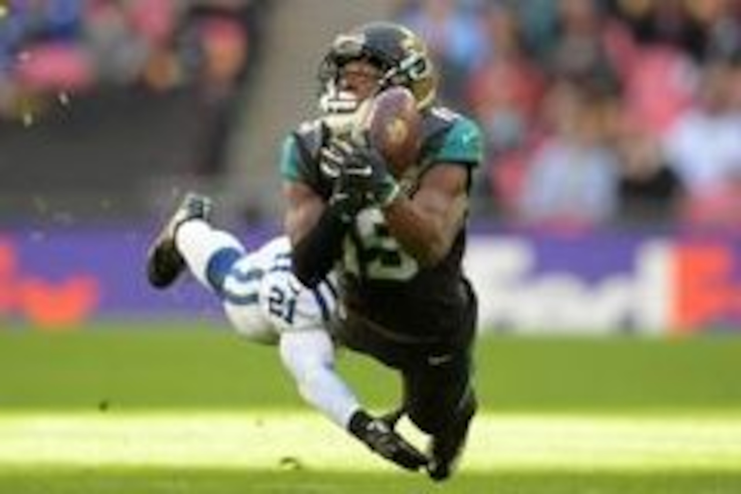 Oct 2, 2016; London, United Kingdom; Jacksonville Jaguars wide receiver Allen Robinson (15) is defended by Indianapolis Colts cornerback Vontae Davis (21) in the third quarter at Wembley Stadium. The Jaguars defeated the Colts 30-27. Mandatory Credit: Kir