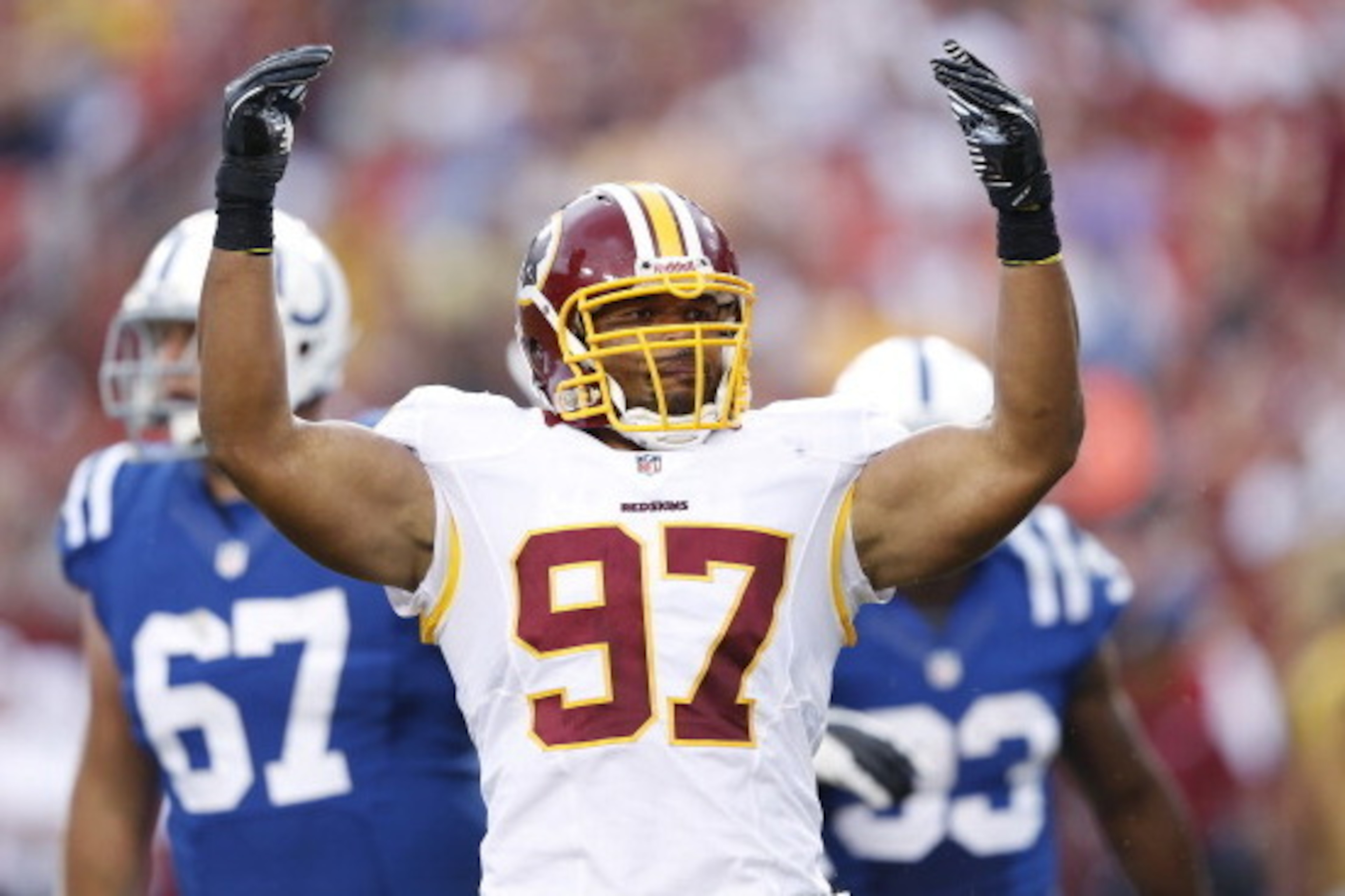 LANDOVER, MD - AUGUST 25: Lorenzo Alexander #97 of the Washington Redskins celebrates against the Indianapolis Colts during a preseason NFL game at FedEx Field on August 25, 2012 in Landover, Maryland. The Redskins beat the Colts 30-17. (Photo by Joe Robb