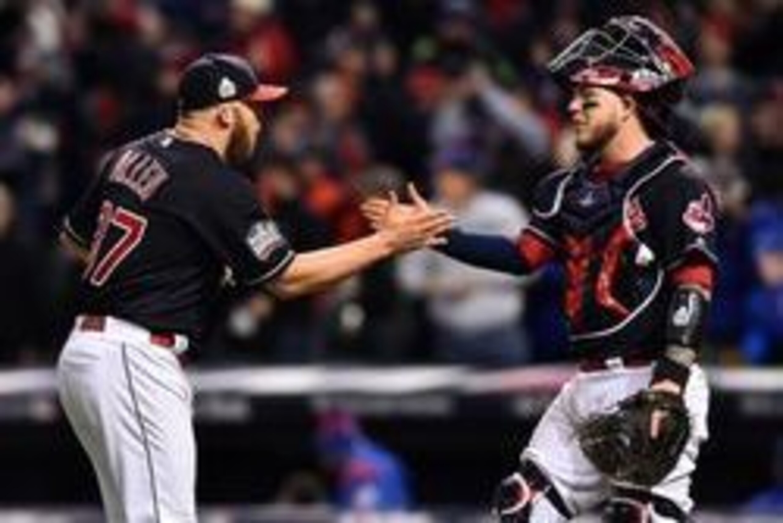 Oct 25, 2016; Cleveland, OH, USA; Cleveland Indians relief pitcher Cody Allen (37) celebrates with catcher Roberto Perez (right) after defeating the Chicago Cubs in game one of the 2016 World Series at Progressive Field. Mandatory Credit: Ken Blaze-USA TO