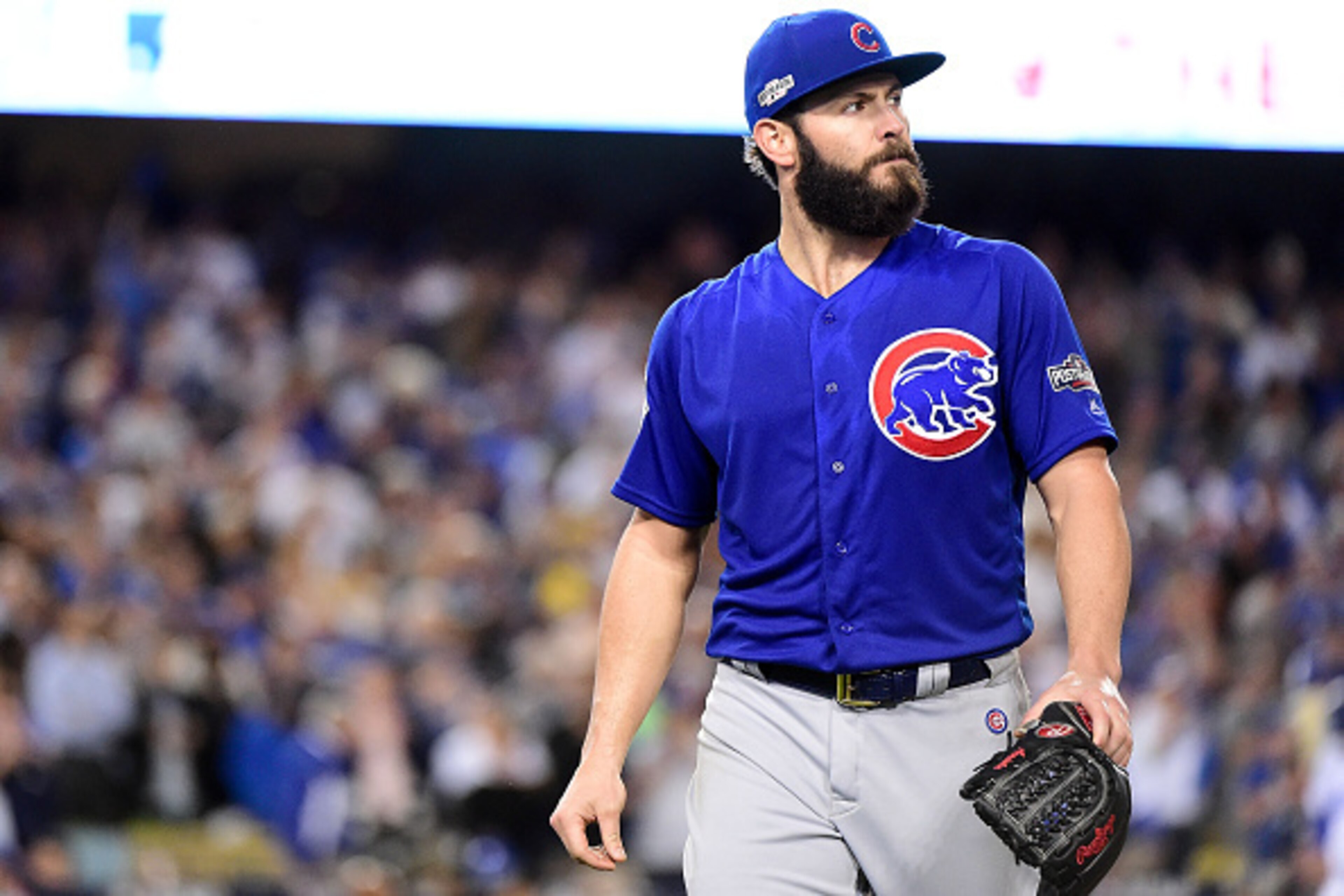 LOS ANGELES, CA - OCTOBER 18:  Jake Arrieta #49 of the Chicago Cubs walks off the field after being taken out of the game in the sixth inning against the Los Angeles Dodgers in game three of the National League Championship Series at Dodger Stadium on Oct