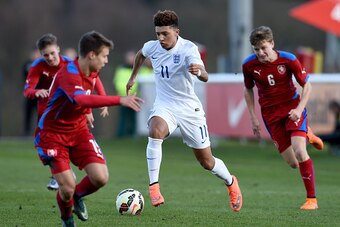 BURTON-UPON-TRENT, ENGLAND - FEBRUARY 18:  Jadon Sancho of England in action during the England v Czech Republic  U16s International Friendly at St Georges Park on February 18, 2016 in Burton-upon-Trent, England.  (Photo by Ross Kinnaird/Getty Images)