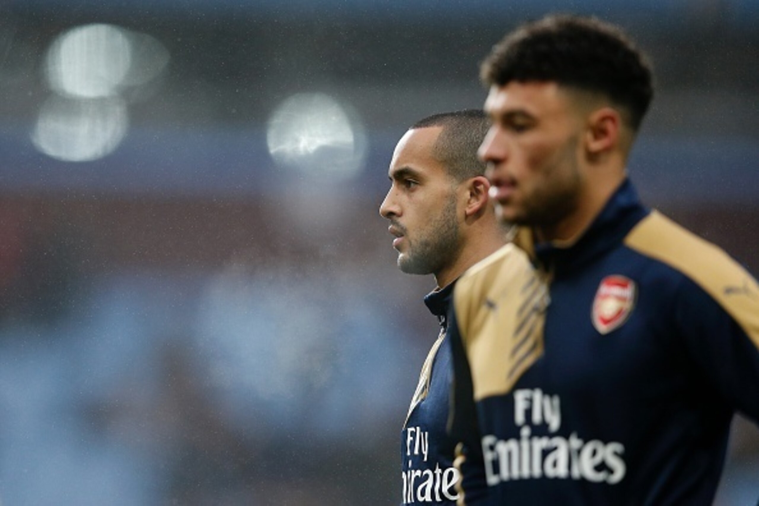 Arsenal's English midfielder Theo Walcott (L) and Arsenal's English midfielder Alex Oxlade-Chamberlain warm up ahead of the English Premier League football match between Aston Villa and Arsenal at Villa Park in Birmingham, central England on December 13, Arsenal's English midfielder Theo Walcott (L) and Arsenal's English midfielder Alex Oxlade-Chamberlain warm up ahead of the English Premier League football match between Aston Villa and Arsenal at Villa Park in Birmingham, central England on December 13,