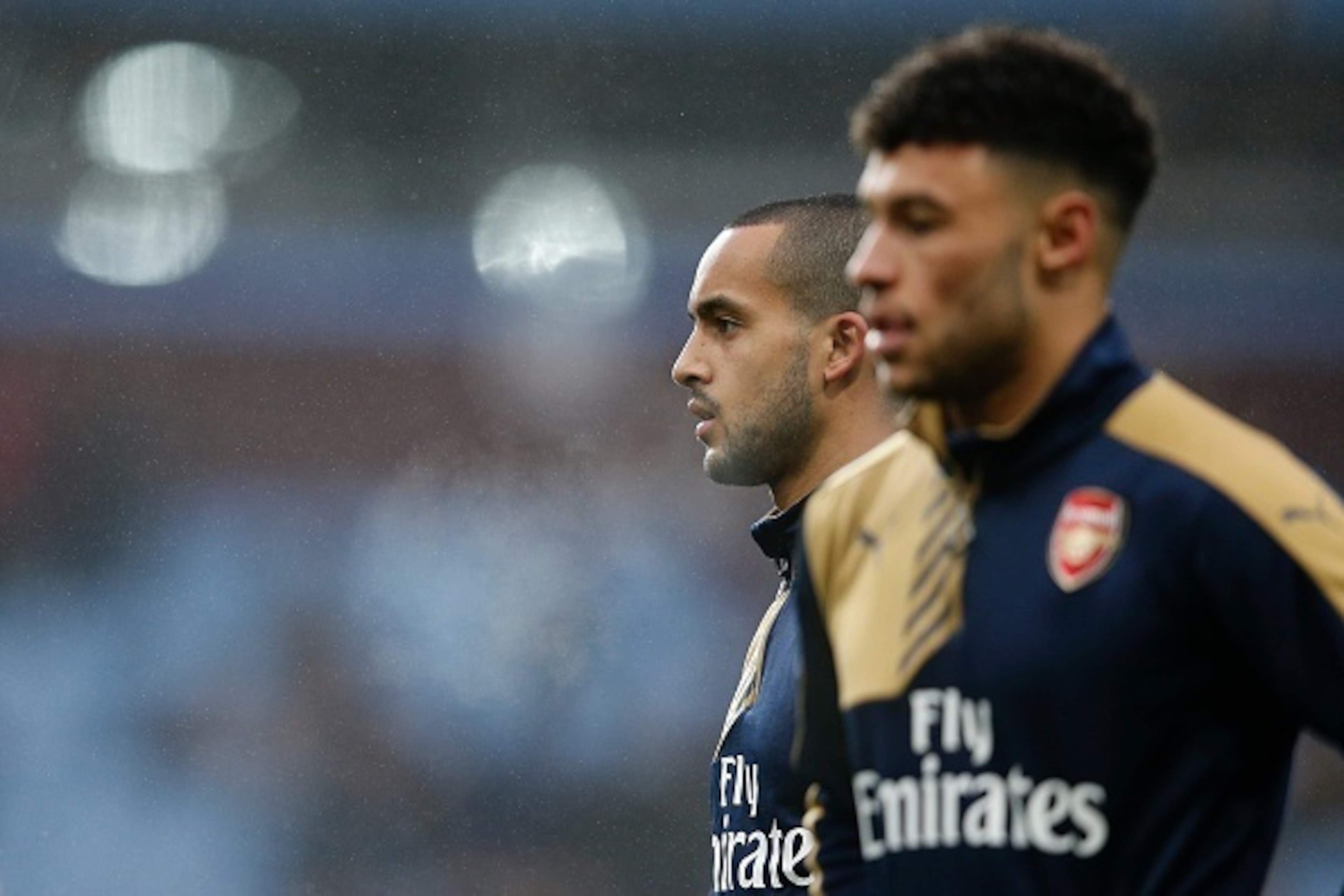 Arsenal's English midfielder Theo Walcott (L) and Arsenal's English midfielder Alex Oxlade-Chamberlain warm up ahead of the English Premier League football match between Aston Villa and Arsenal at Villa Park in Birmingham, central England on December 13, Arsenal's English midfielder Theo Walcott (L) and Arsenal's English midfielder Alex Oxlade-Chamberlain warm up ahead of the English Premier League football match between Aston Villa and Arsenal at Villa Park in Birmingham, central England on December 13,