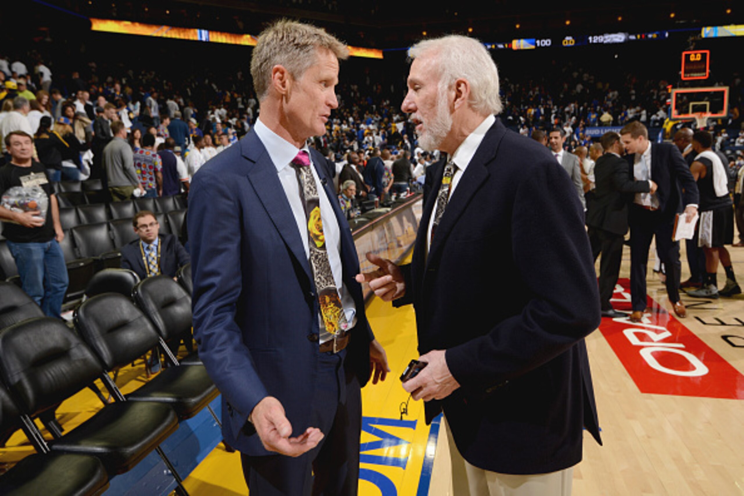 OAKLAND, CA - OCTOBER 25:  Steve Kerr of the Golden State Warriors and Gregg Popovich of the San Antonio Spurs talk after a game on October 25, 2016 at ORACLE Arena in Oakland, California. NOTE TO USER: User expressly acknowledges and agrees that, by down