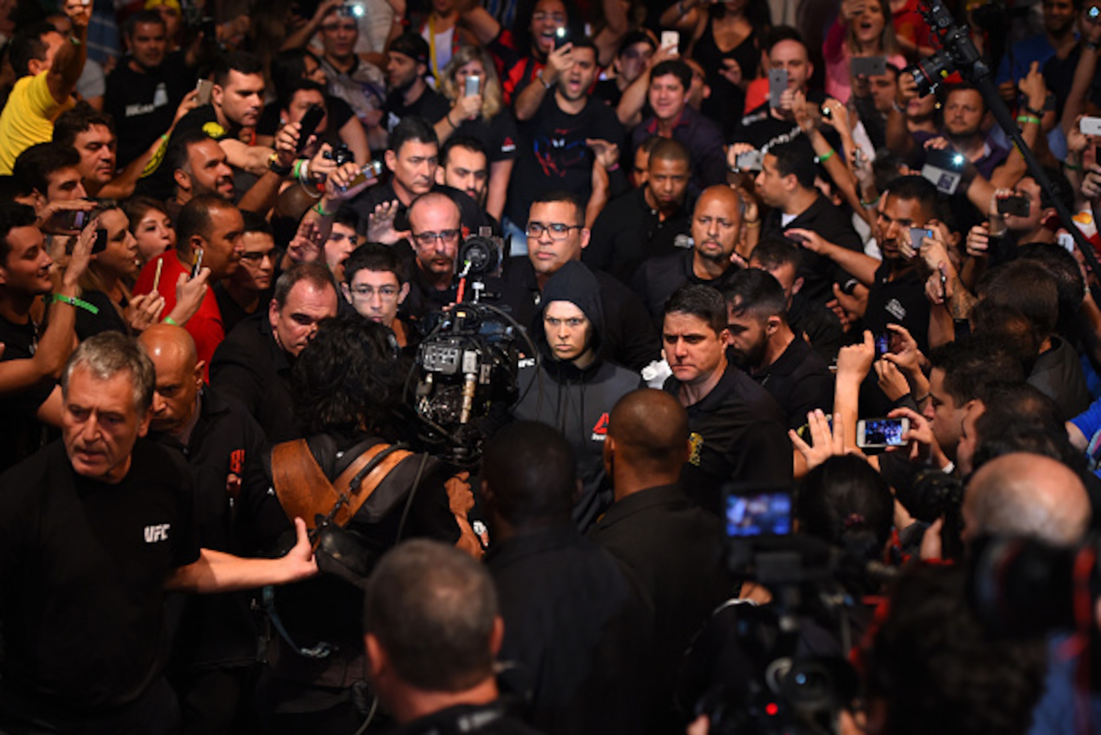 RIO DE JANEIRO, BRAZIL - AUGUST 01:  UFC women's bantamweight champion Ronda Rousey enters the arena prior to facing Bethe Correira in their UFC women's bantamweight championship bout during the UFC 190 event inside HSBC Arena on August 1, 2015 in Rio de 