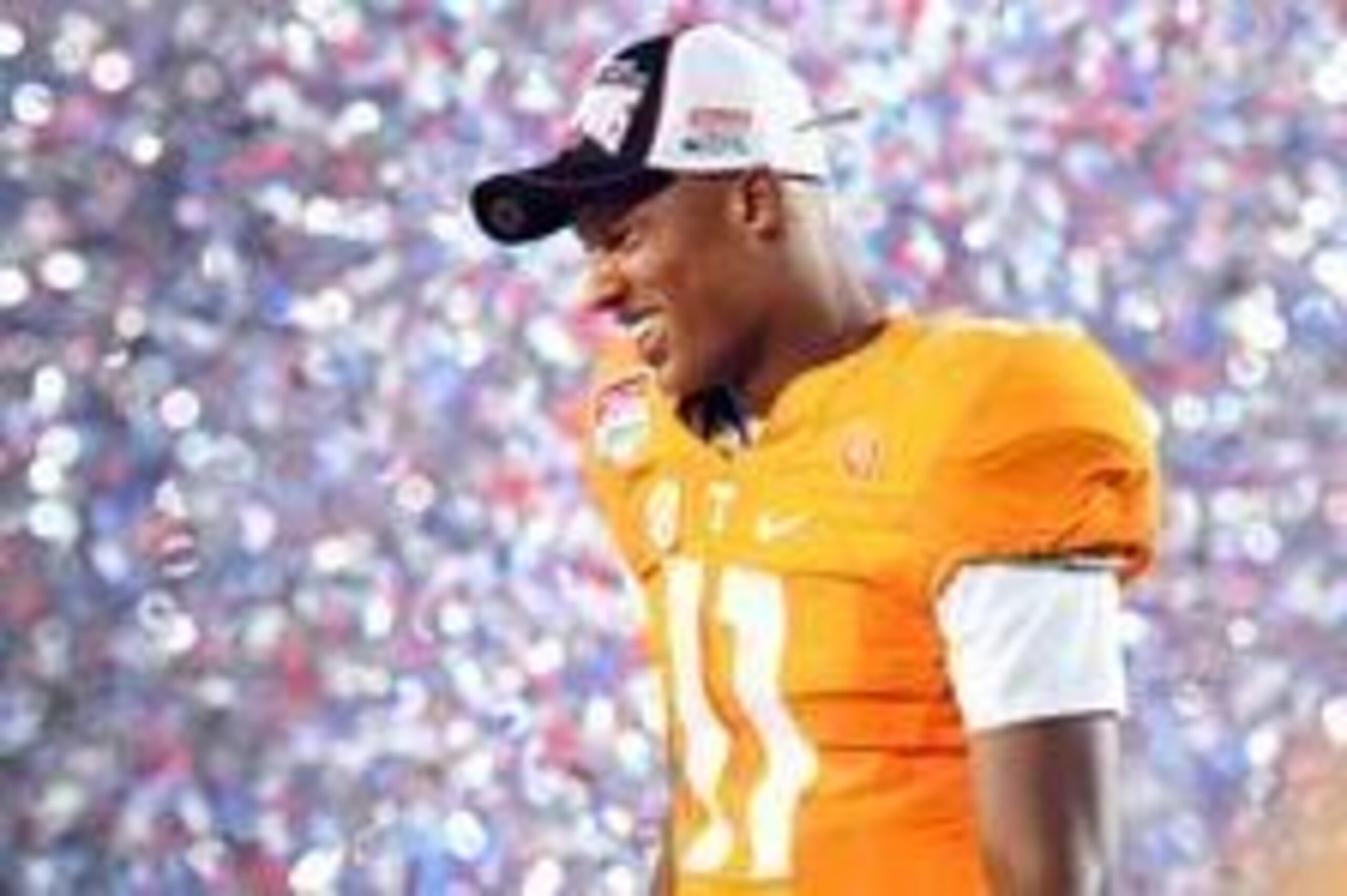 Sep 10, 2016; Bristol, TN, USA; Tennessee Volunteers quarterback Joshua Dobbs (11) celebrates after a win against the Virginia Tech Hokies at Bristol Motor Speedway. Tennessee won 45-24. Mandatory Credit: Christopher Hanewinckel-USA TODAY Sports