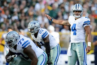 GREEN BAY, WI - OCTOBER 16: Dak Prescott #4 of the Dallas Cowboys calls a play at the line of scrimmage against the Green Bay Packers during the game on October 16, 2016 at Lambeau Field in Green Bay, Wisconsin. The Cowboys defeated the Packers 30-16. (Ph