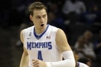 Jan 28, 2015; Memphis, TN, USA; Memphis Tigers forward Austin Nichols (4) reacts after the play against the East Carolina Pirates during the game at FedExForum. Mandatory Credit: Justin Ford-USA TODAY Sports