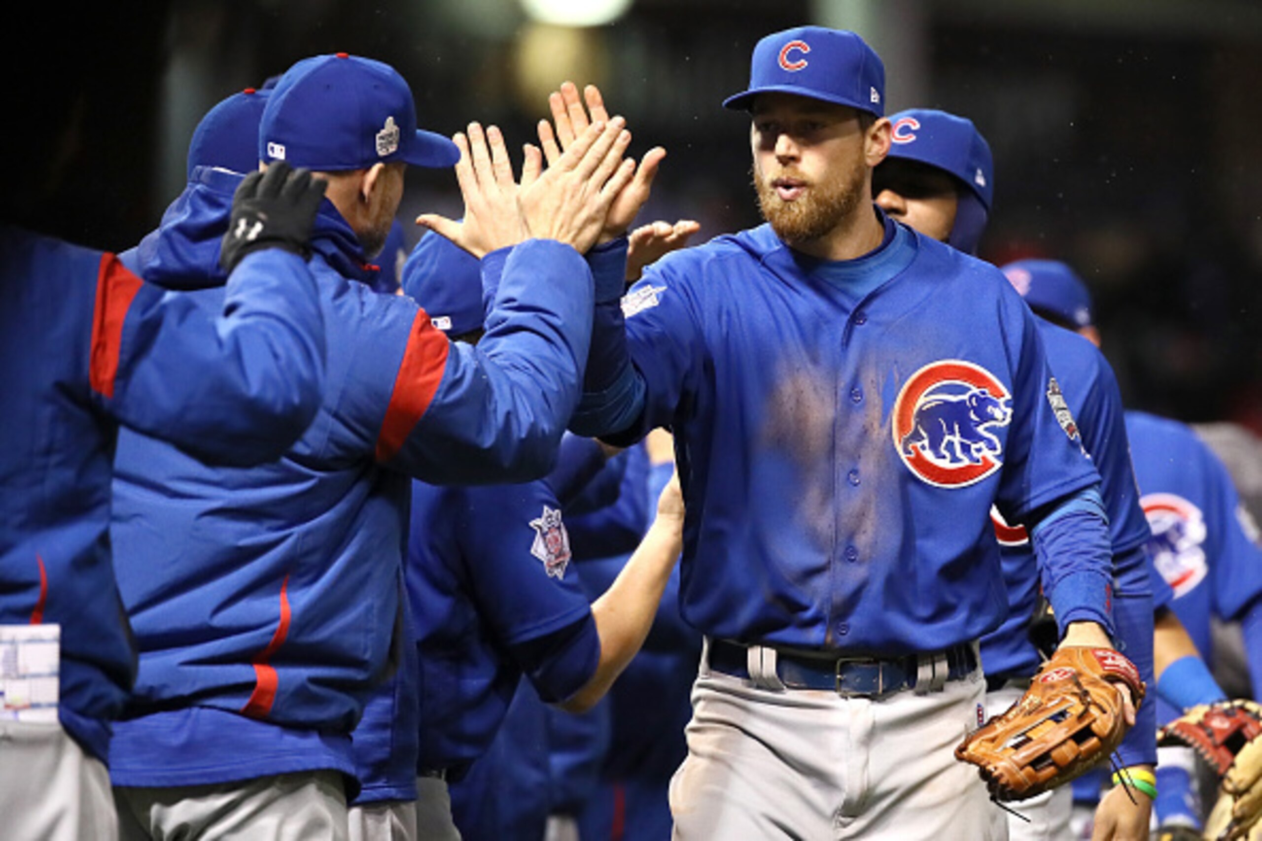 CLEVELAND, OH - OCTOBER 26:  Ben Zobrist #18 of the Chicago Cubs high fives teammates after defeating the Cleveland Indians 5-1 in Game Two of the 2016 World Series at Progressive Field on October 26, 2016 in Cleveland, Ohio.  (Photo by Ezra Shaw/Getty Im