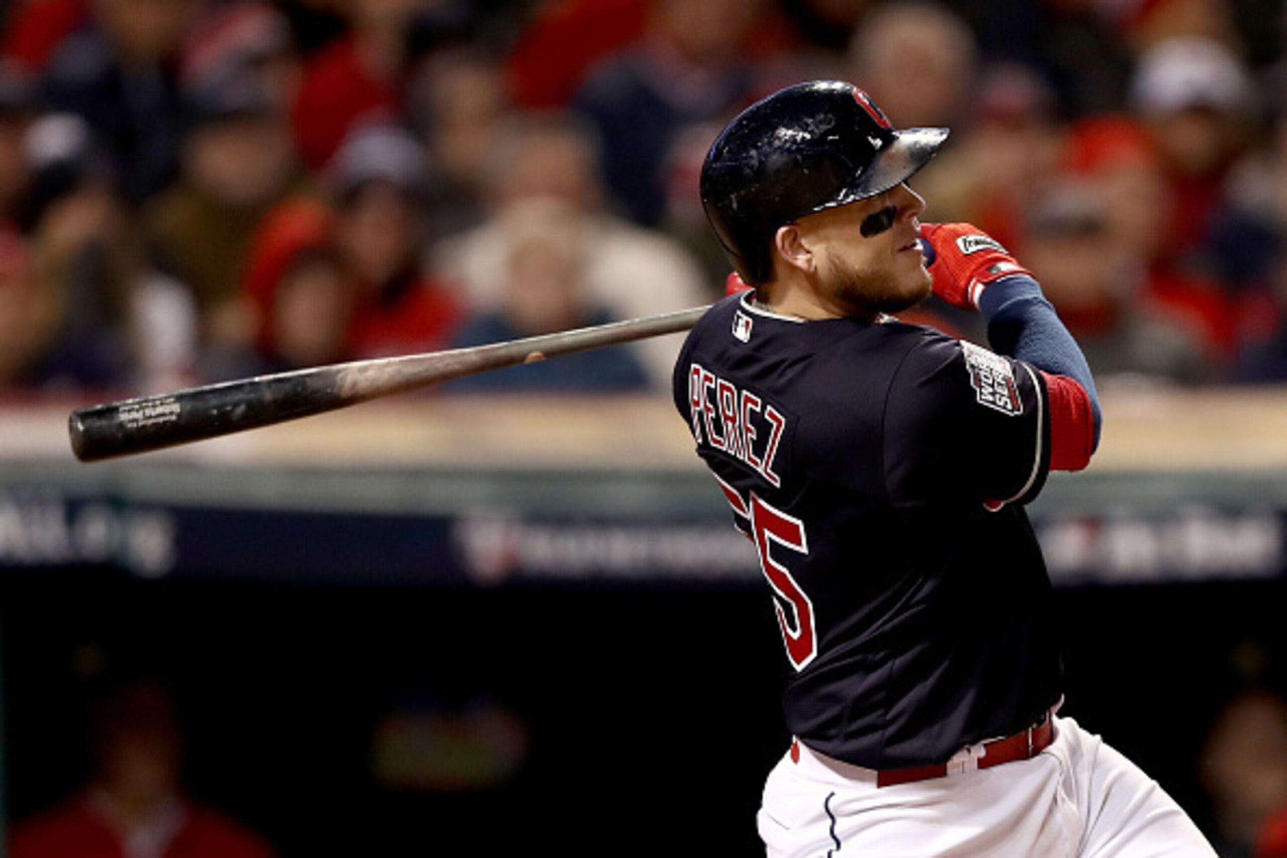 CLEVELAND, OH - OCTOBER 25:  Roberto Perez #55 of the Cleveland Indians hits a three-run home run during the eighth inning against the Chicago Cubs in Game One of the 2016 World Series at Progressive Field on October 25, 2016 in Cleveland, Ohio.  (Photo b