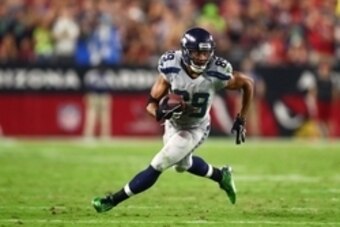 Oct 23, 2016; Glendale, AZ, USA; Seattle Seahawks wide receiver Doug Baldwin (89) runs the ball in the fourth quarter against the Arizona Cardinals at University of Phoenix Stadium. The game ended in a 6-6 tie after overtime. Mandatory Credit: Mark J. Reb