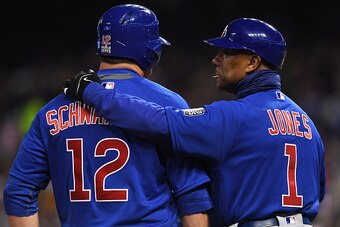 CLEVELAND, OH - OCTOBER 26:  Kyle Schwarber #12 of the Chicago Cubs talks with third base coach Gary Jones #1 against the Cleveland Indians in Game Two of the 2016 World Series at Progressive Field on October 26, 2016 in Cleveland, Ohio.  (Photo by Jason 