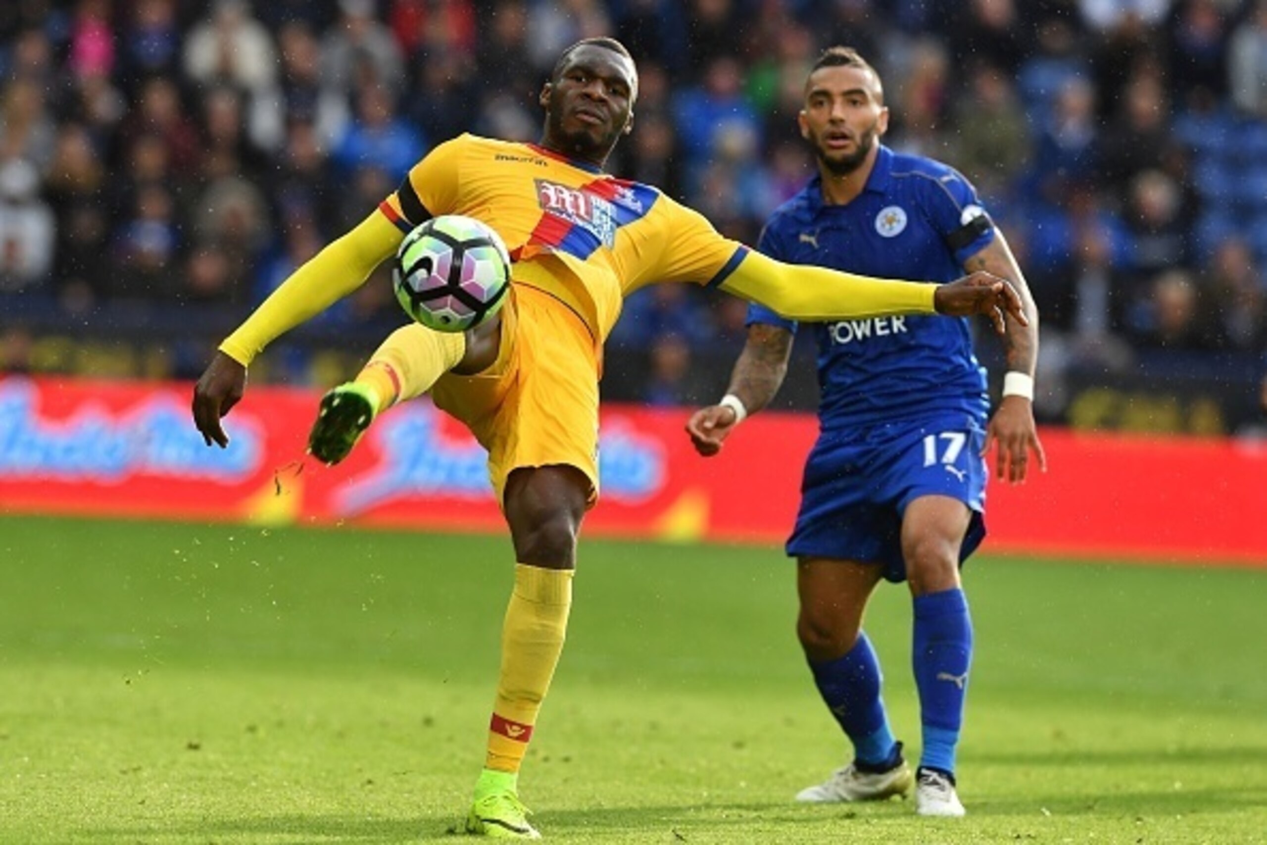 Crystal Palace's Zaire-born Belgian striker Christian Benteke clears the ball during the English Premier League football match between Leicester City and Crystal Palace at King Power Stadium in Leicester, central England on October 22, 2016. / AFP / Ben S
