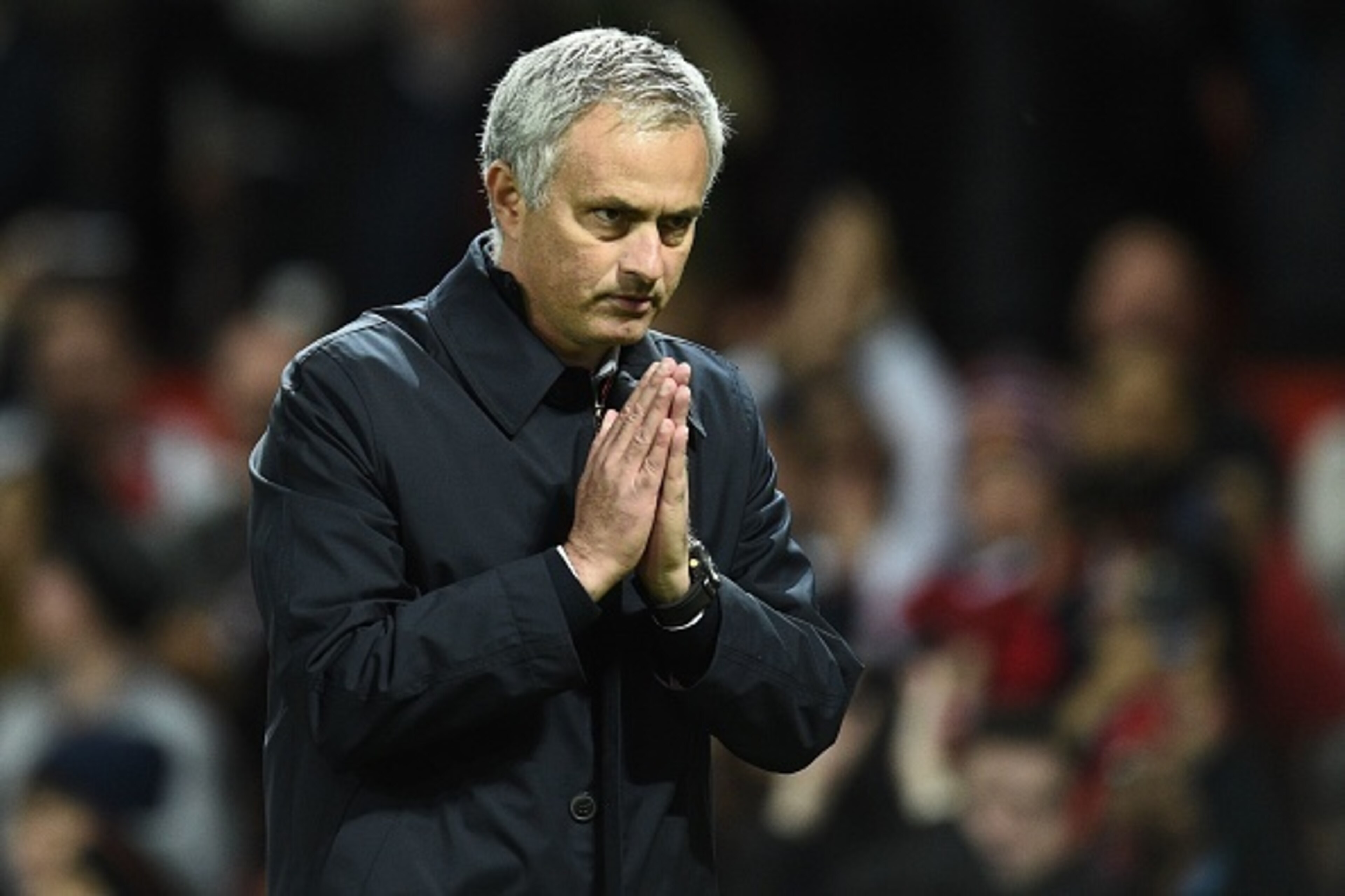 Manchester United's Portuguese manager Jose Mourinho gestures to supporters after the EFL (English Football League) Cup fourth round match between Manchester United and Manchester City at Old Trafford in Manchester, north west England on October 26, 2016. Manchester United's Portuguese manager Jose Mourinho gestures to supporters after the EFL (English Football League) Cup fourth round match between Manchester United and Manchester City at Old Trafford in Manchester, north west England on October 26, 2016.