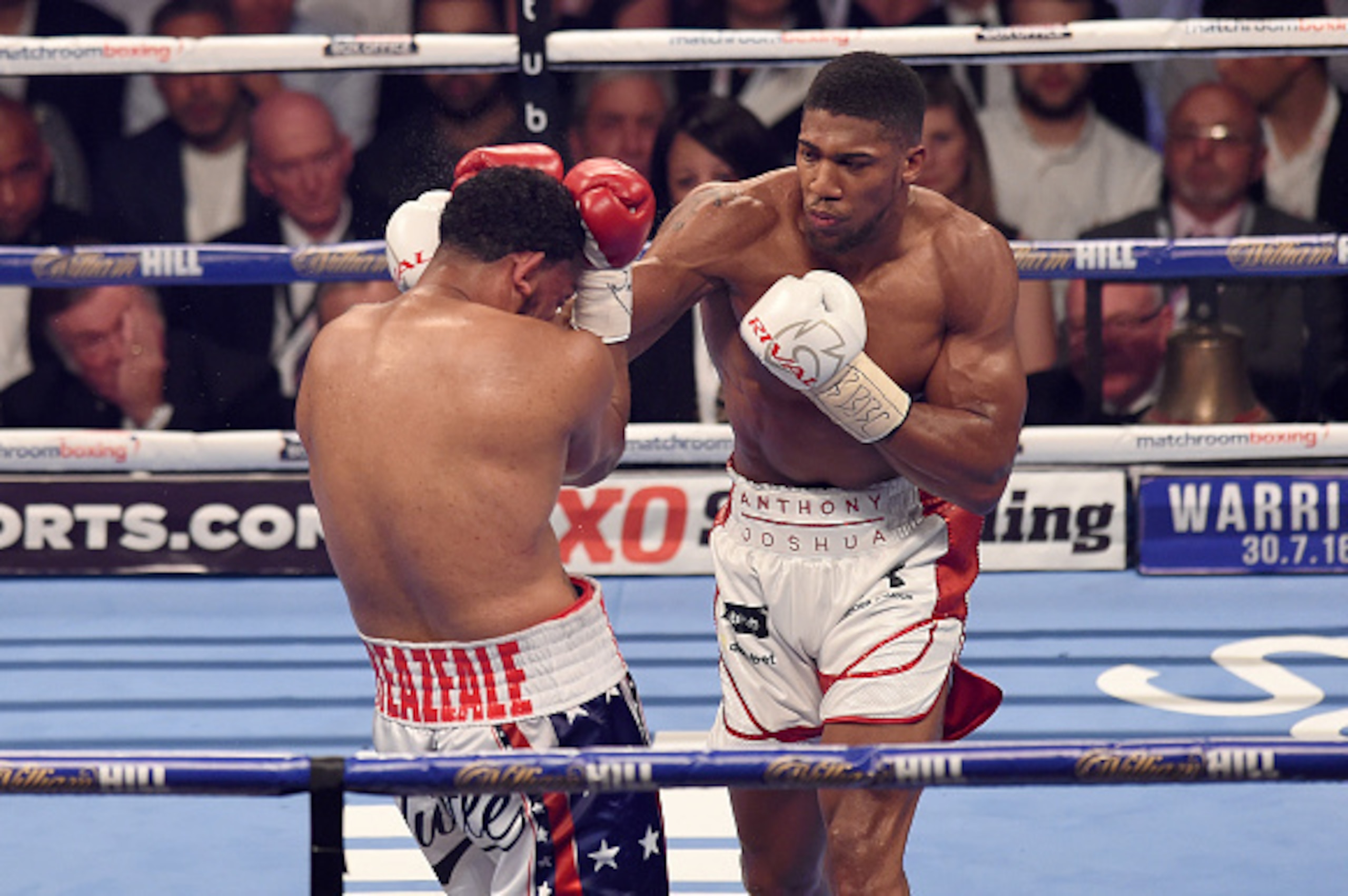 LONDON, ENGLAND - JUNE 25: Anthony Joshua (R) boxing Dominic Breazeale for the IBF World Heavyweight Title at The O2 Arena on June 25, 2016 in London, England. (Photo by Leigh Dawney/Getty Images) LONDON, ENGLAND - JUNE 25: Anthony Joshua (R) boxing Dominic Breazeale for the IBF World Heavyweight Title at The O2 Arena on June 25, 2016 in London, England. (Photo by Leigh Dawney/Getty Images)