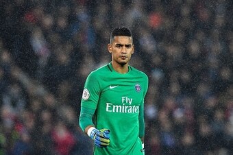 Paris Saint-Germain's French goalkeeper Alphonse Areola walks in the rain during the French L1 football match between Paris Saint-Germain and Olympique of Marseille at the Parc des Princes stadium in Paris on October 23, 2016. / AFP / FRANCK FIFE        (
