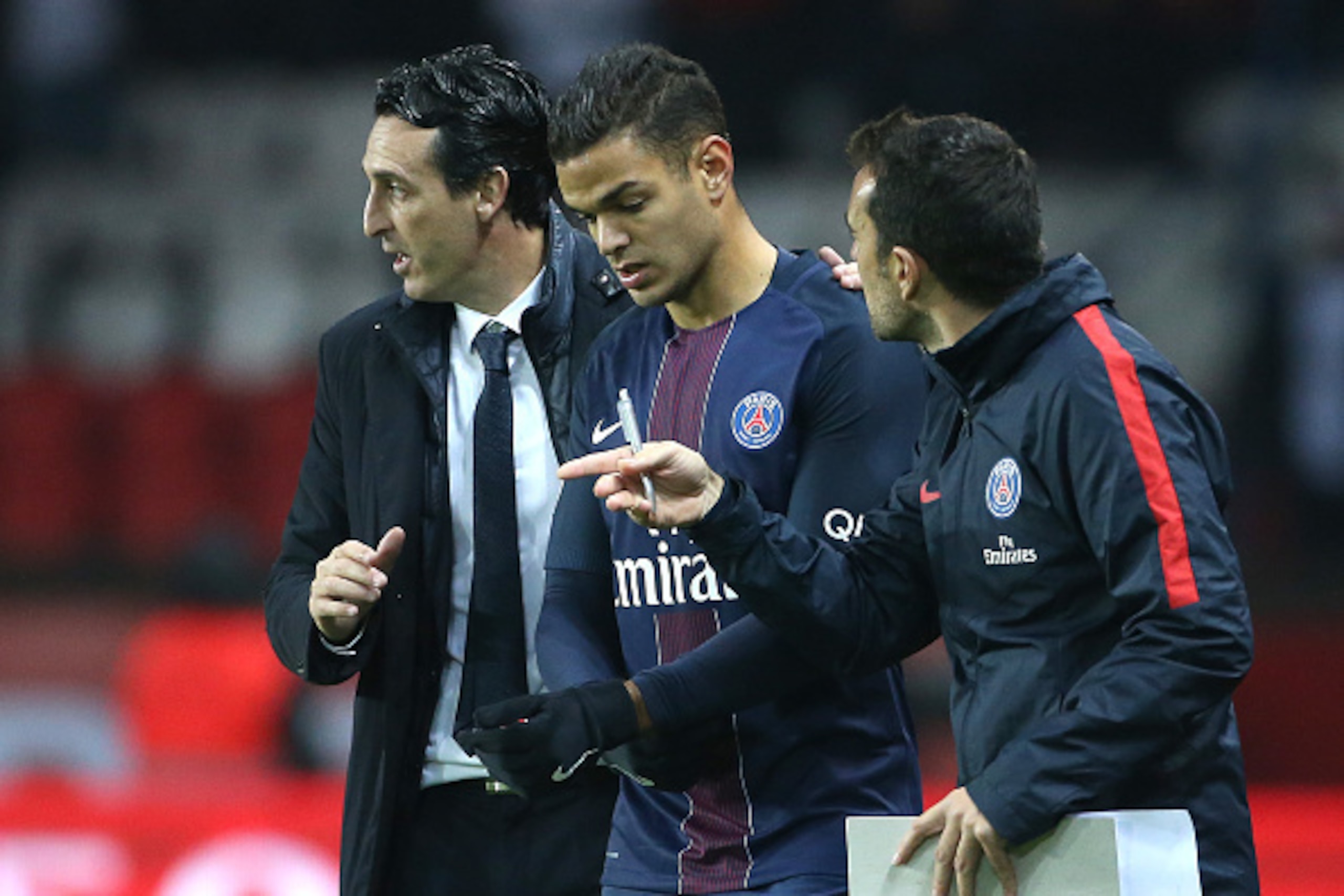 PARIS, FRANCE - OCTOBER 23: Coach of PSG Unai Emery and Hatem Ben Arfa of PSG during the French Ligue 1 match between Paris Saint-Germain (PSG and Olympique de Marseille (OM) at Parc des Princes stadium on October 23, 2016 in Paris, France. (Photo by Jean