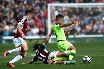 BURNLEY, ENGLAND - AUGUST 20:  George Boyd of Burnley battles with Phillipe Coutinho of Liverpool during the Premier League match between Burnley and Liverpool at Turf Moor on August 20, 2016 in Burnley, England.  (Photo by Jan Kruger/Getty Images)